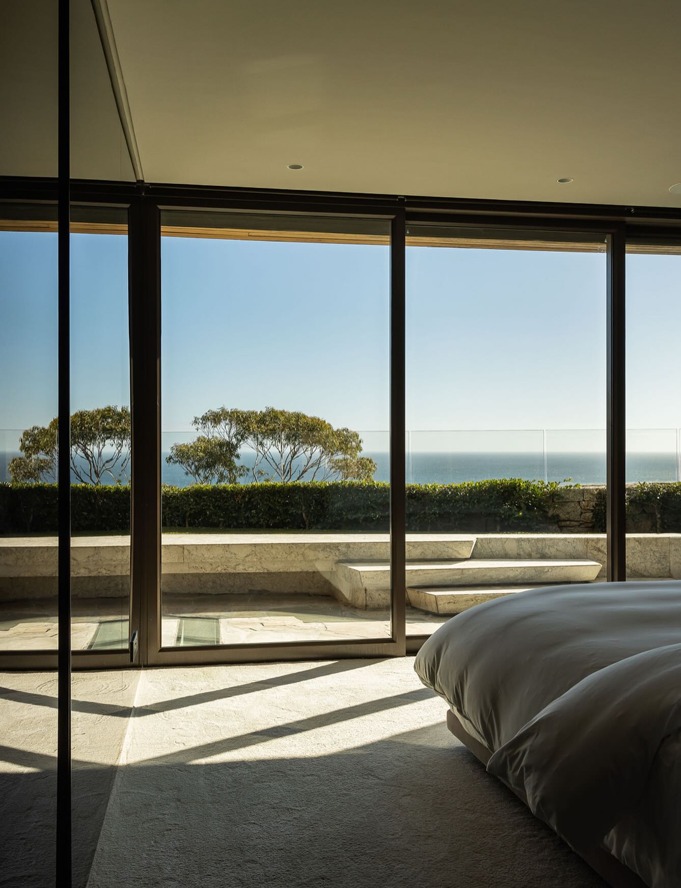 Every corridor leads to calm. Every detail - from the curve of the stairwell to the hush of the concrete-encourages stillness.