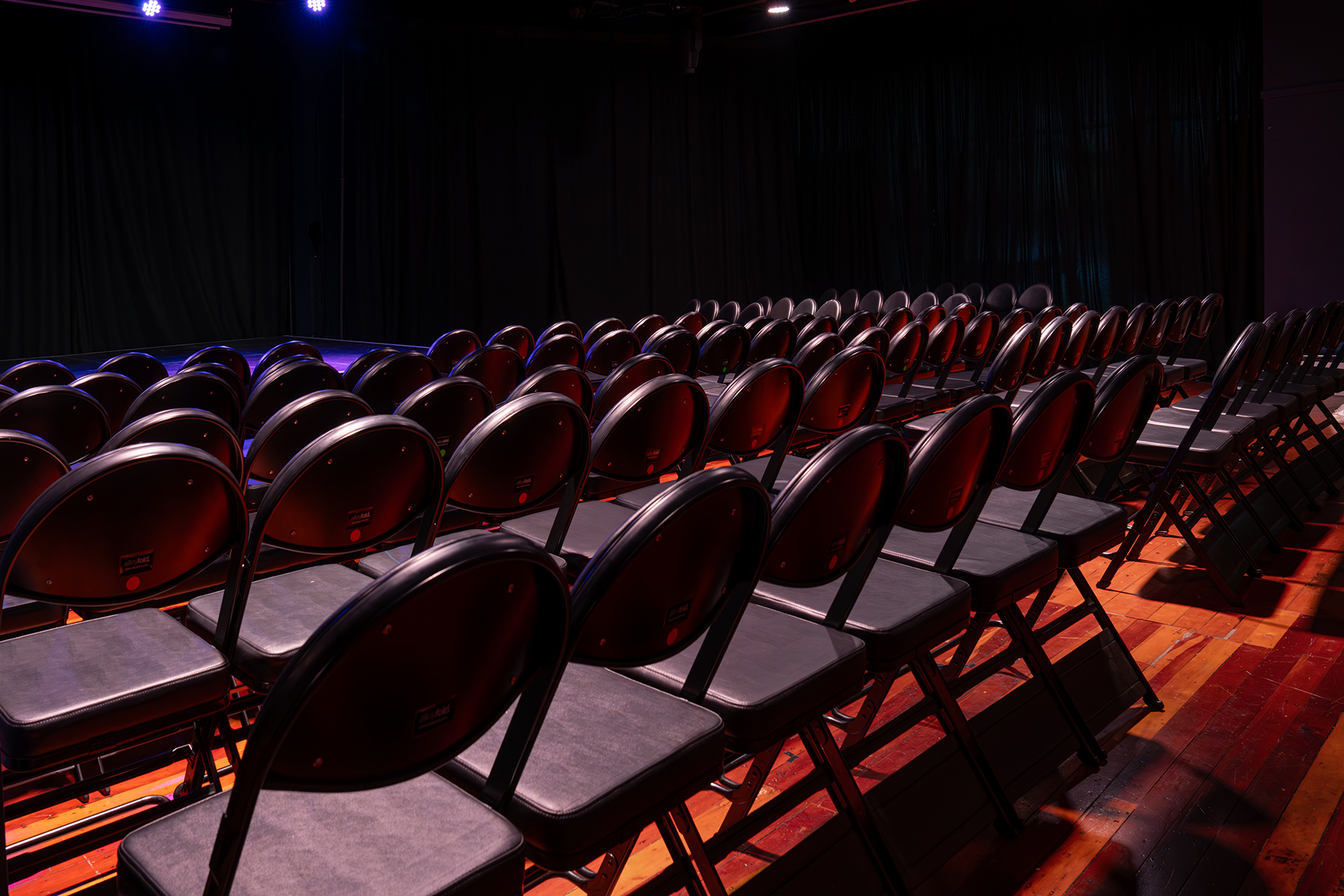 I photographed this series for Alloyfold and decided to keep the stage lighting on, intentionally.
These chairs are designed for spaces filled with energy, anticipation, and atmosphere. I wanted to reflect that in the images. The glow, the shadows, the texture, all working together to show how Alloyfold’s chairs don’t just fit into the environment, they enhance it.
Strong, stackable, and stylish, these seats are ready for the spotlight, just like the people who sit in them.
#Alloyfold #CommercialPhotography #VenueDesign #StageSeating #TheatreVibes #LightingMatters #FurnitureDesign #DunedinPhotographer #BehindTheScenes #DesignWithPurpose