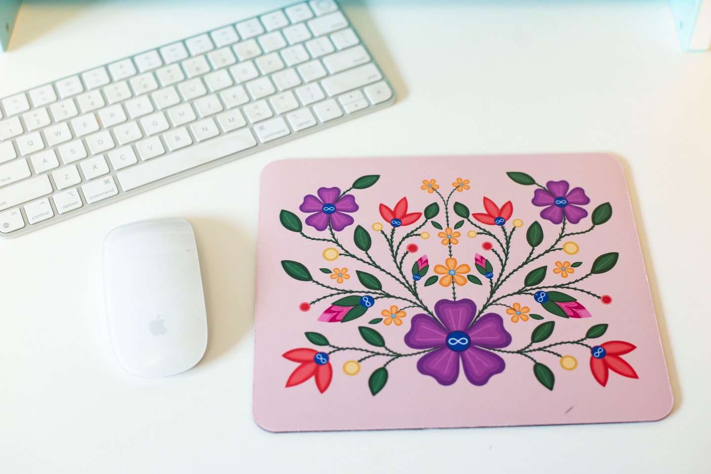 Add a splash of colour and stunning Métis florals to your workspace with this mouse pad. Visit my Etsy shop via the link in my bio.