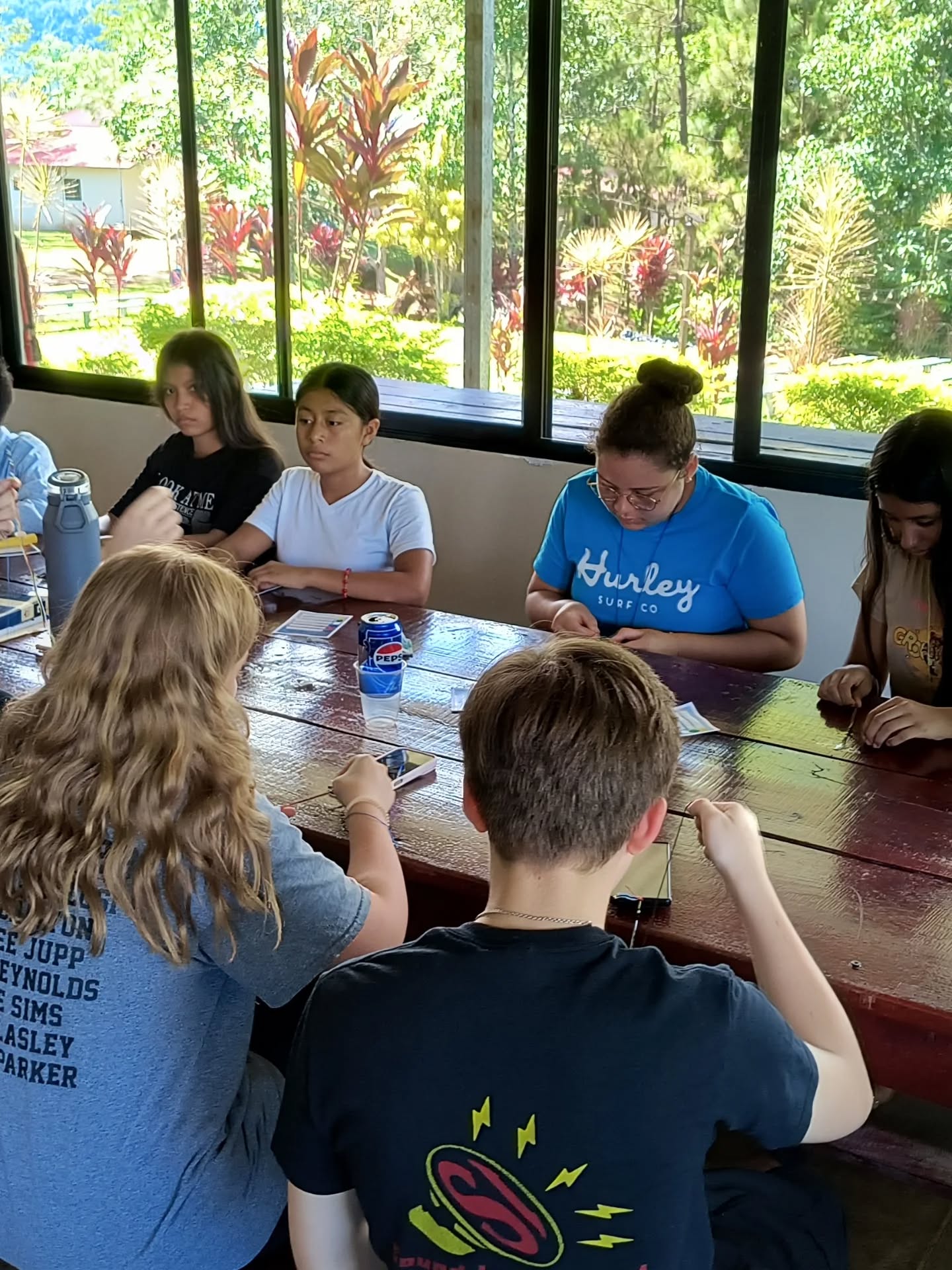 Honduras Day 4- Today the Extreme Camp came to an end after lunch. Before it ended however, three of our young ladies, Mia, Abree, and Natalie led small group Bible studies (they each did an awesome job speaking through translators about Pentecost). Followed up by Olivia and Jennifer Cameron giving instructions on how to create salvation friendship bracelets and then our final time of worship. We then spent the rest of the day going to the lake (for about 15 minutes before lightning put an end to that), playing soccer and students working on their testimonies to share tomorrow in Caliche. It was another awesome day but we can get grumpy when they're long days. 🤣