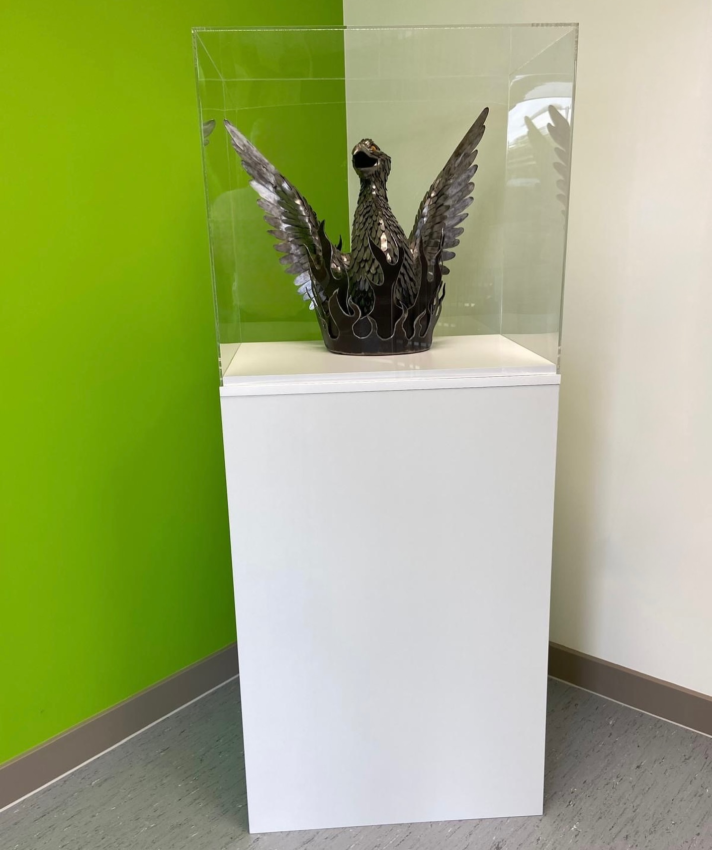 We had the pleasure of creating this large custom display case for a secondary school recently. The Phoenix is the symbol for this school and this beautiful metal work sculpture was completed by a student of the school. Perfect display to keep a wonderful piece by a very talented student safe and sound for years to come. With this piece being so large we did complete a custom plate for the base to screw into the ground for that extra security and safety aspect #customdisplay #acrylicdisplaycase #acrylic #madeinireland #sculpture #sculpturedisplay