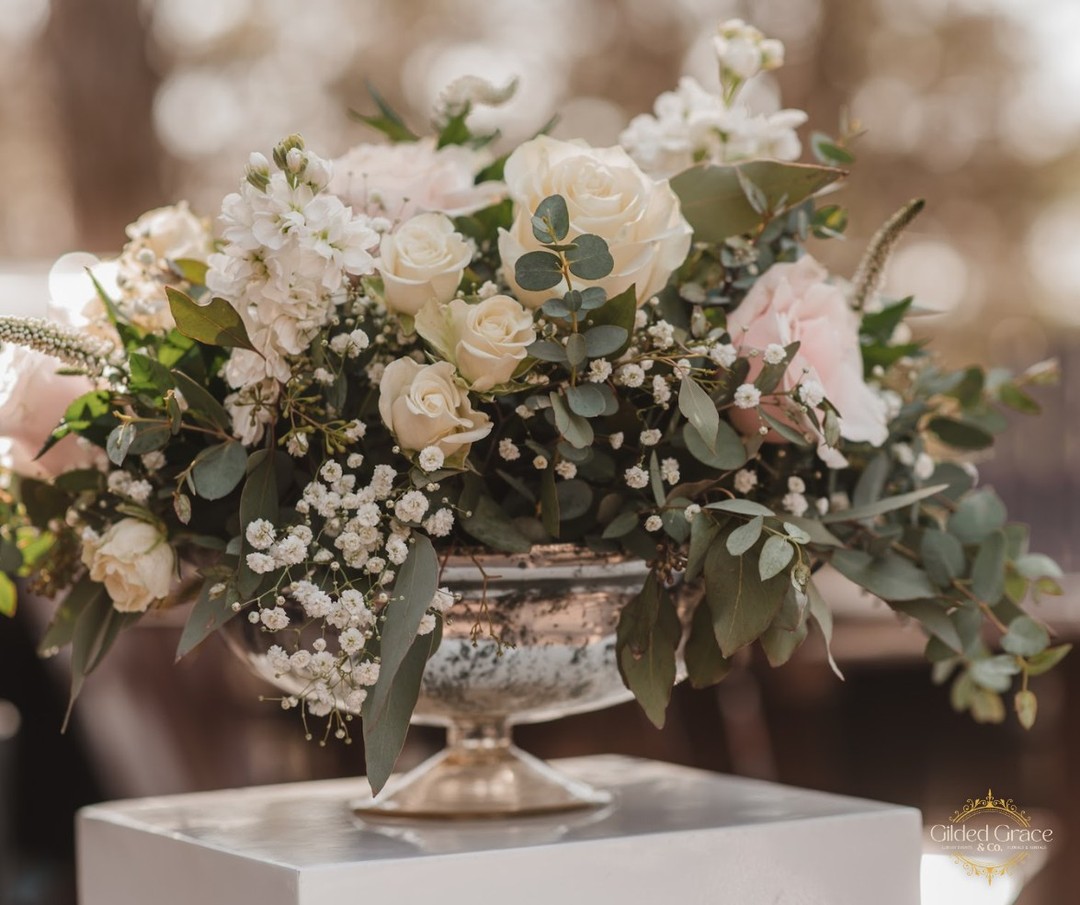 Try a compote style arrangement for dinner table centerpieces