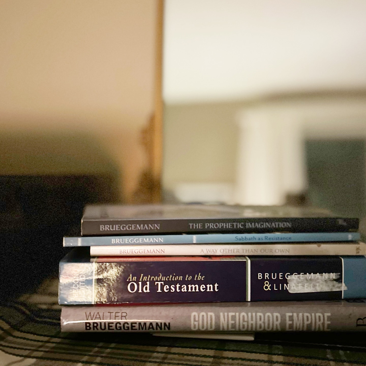 “Jesus is remembered and presented by the early church as the faithful embodiment of an alternative consciousness…He has the authority to show the deathly end of the dominant culture. Quite clearly, the one thing the dominant culture cannot tolerate or co-opt is compassion, the ability to stand in solidarity with the victims of the present order.”
Most people don’t have a favorite Old Testament theologian, but Walter Brueggemann was mine. His book, The Prophetic Imagination, was life-altering for me. This meager hard copy pile, even if I add in my many ebooks and pdfs, is a paltry representation of his over 100 books and lifetime of faithfulness. I am grateful for his 92 years of life.