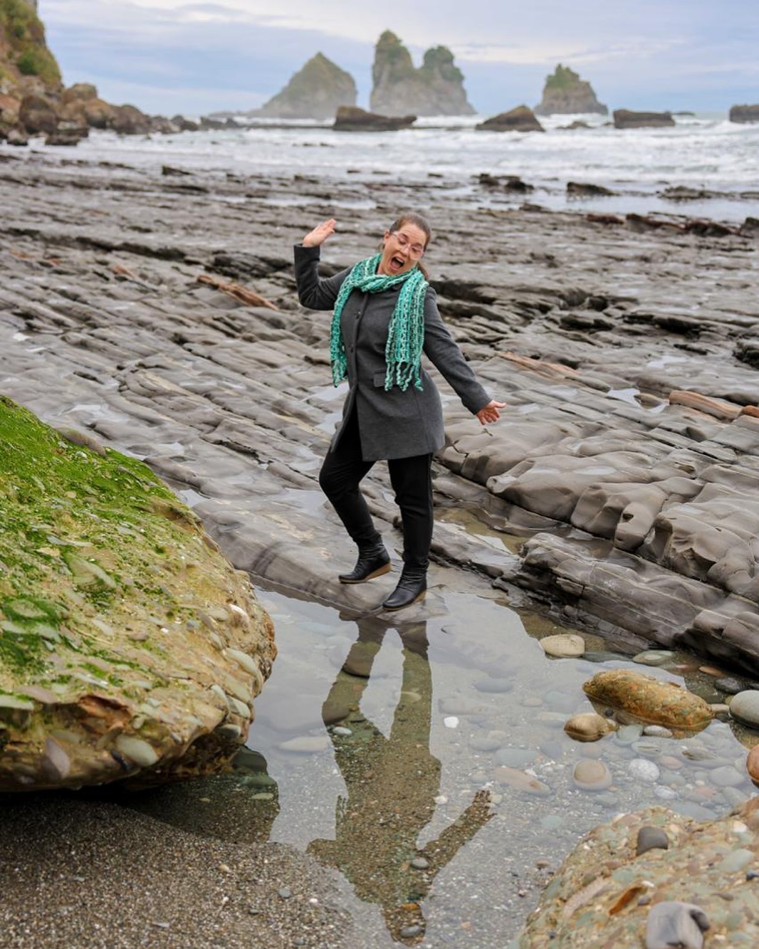Yes, winter beach elopements are a thing and we had a gorgeous one today. Gen is not only a great celebrant, but a handy puddle model to help find good places for photos!