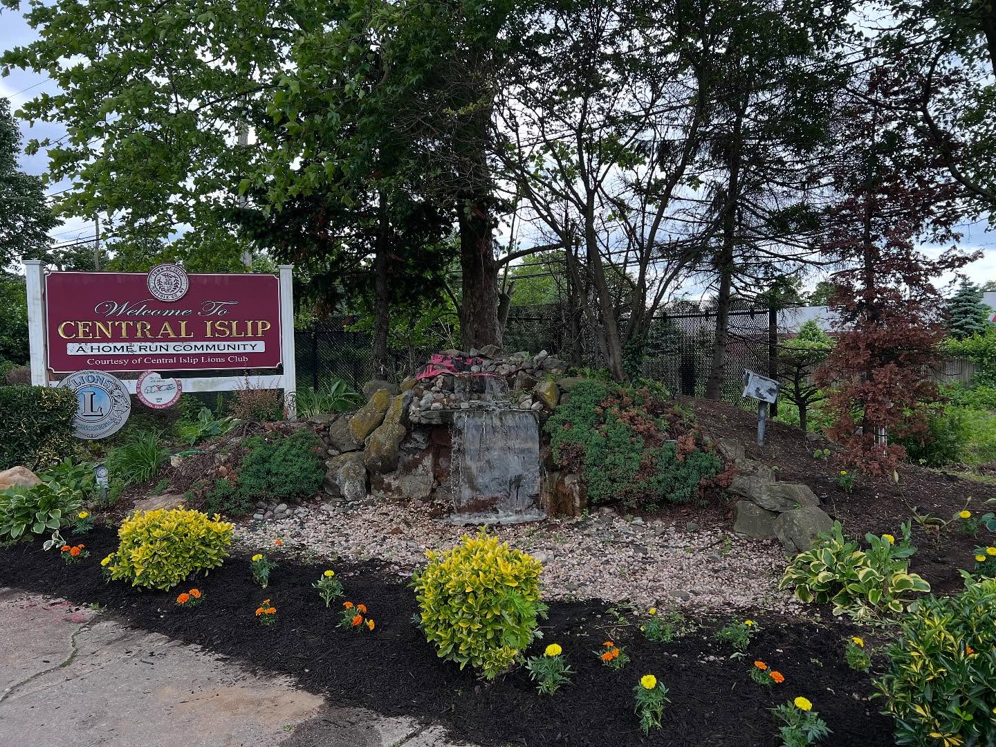 One beautification down and another to go!
About a week ago, CI Connects For Change transformed the waterfall at the corner of Suffolk Ave and Carleton Ave into a vibrant community gem! A huge thank you to the Lions Club and the CI Fire Department for their incredible support. It takes a community to take care of the community.
Together, we’re making Central Islip shine one project at a time! 💜💛