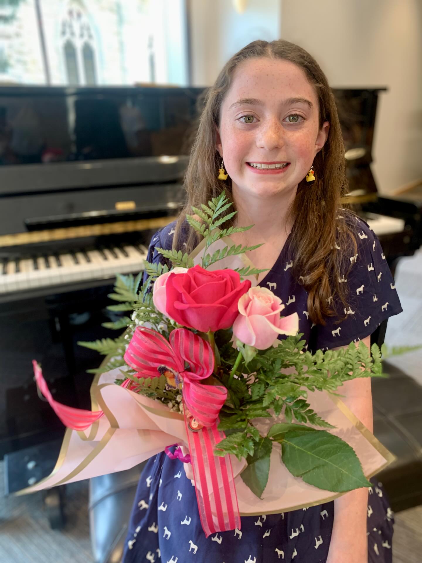 Celebrating this rising 6th grader at her piano recital and last day of school⭐️ Rain is good luck 💦 Go Lucy 💖