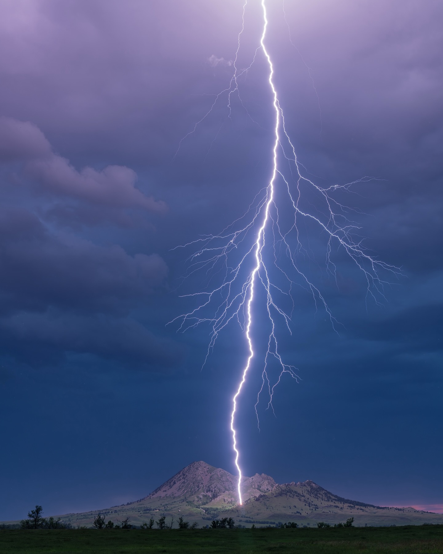 Last night’s storm nearly swallowed me whole—but I got the shot. ⚡️
We set out chasing the Strawberry Moon northeast of Belle Fourche, hoping to catch it rising over the horizon. But instead, a massive wall cloud swept in and claimed the spotlight with a wild light show of its own.
I’ve never been one to cling too tightly to the original plan—especially when nature serves up something this dramatic. That said, I am genuinely terrified of lightning. So we stayed on the move, trying to keep just enough distance between us and the danger zone.
Eventually, east of Bear Butte, I decided to stop running and set up the camera to capture the storm rolling in. Just two frames into the timelapse, a giant bolt tore across the sky—close enough to make me question all my life choices 😅 I was ready to call it then and there.
But my husband—steady and brave—encouraged me to keep the camera rolling just a bit longer. I’m glad he did.
The second and third photos here followed that first heart-pounding strike. A good reminder: nature doesn’t mess around and deserves our full respect. 🫡
As I was packing up my gear to head home, I turned around to the east and guess who decided to show up? The strawberry moon 🙃 Of course, I was in a position that would not have done the moon any justice in a photo. So yeah, that’s the story of my life in a nutshell 😂
#southdakotaweather #stormchase #lightningstrike #southdakota #bearbutte