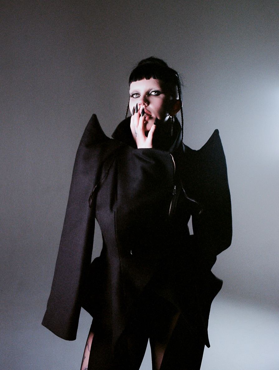 The “EDGE” jacket made by @byleyavictoria
Designer/Creative Director: @byleyavictoria @leya.victoria
Photographer: @real.timevisualz
MUA: @gabbby_palmer
Model: @holakimmylola
Set Assistant: @erinllynne