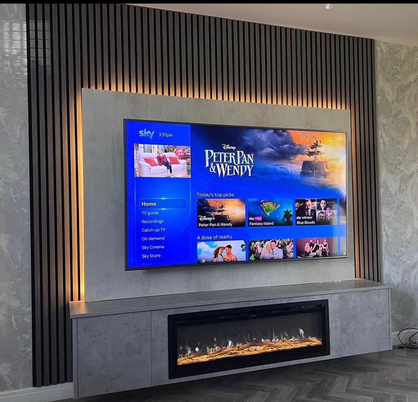 Bespoke Media Walls Made To Measure and Size.
- Upto 3 meters of slats
- Tv panel to match any size of tv
- Floating shelve or cabinets
- All electrics
- Tv work
- Plastered after wiring is done if required
- Warm and cool white led lights behind tv panel
- Slats, tv panel shelf and cabinets laminated to any colour of your choice
Fires and Surrounds Direct
Unit 2 385 Hillington Road
G524BL
