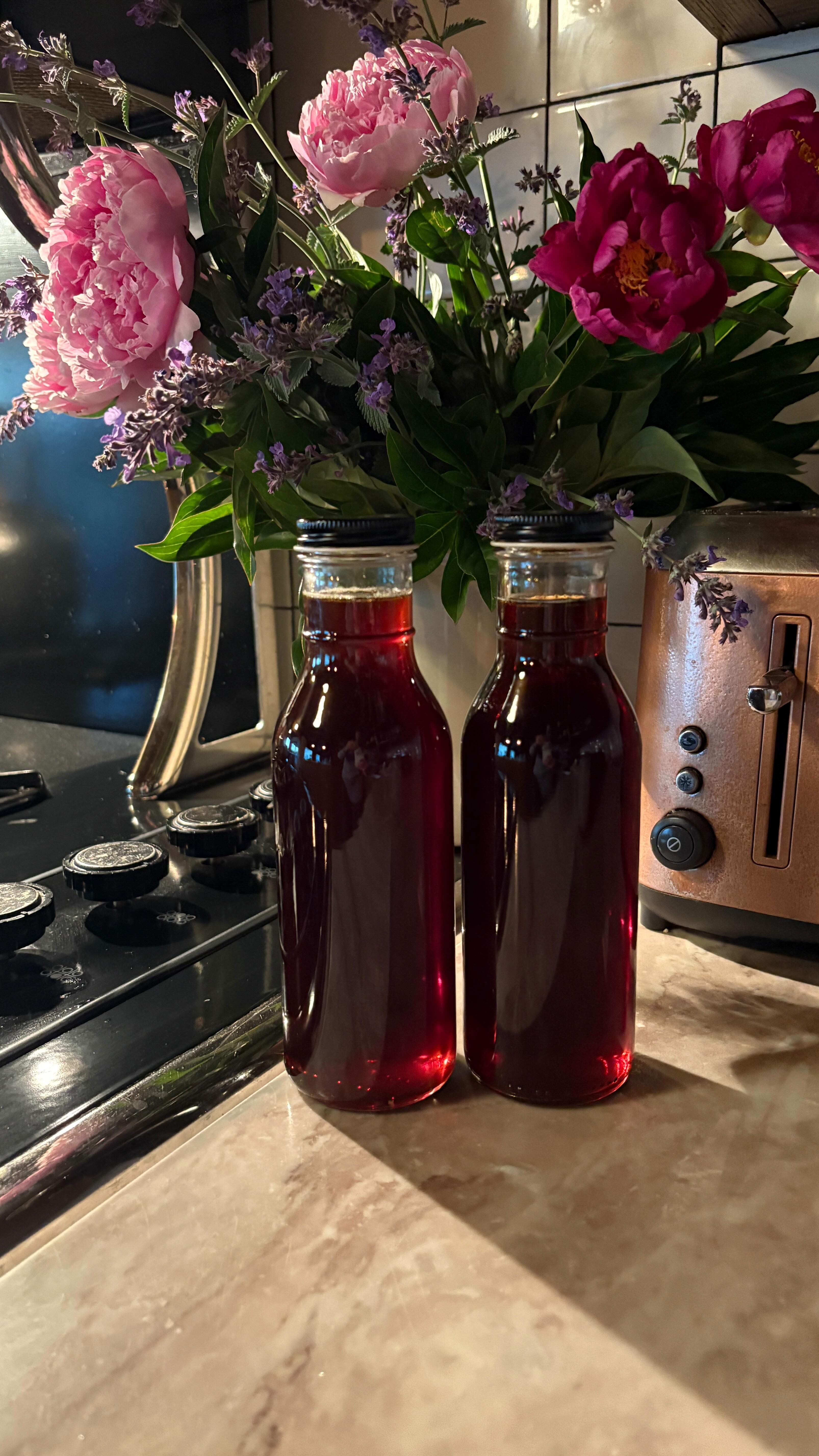 Spruce Tip Syrup
An all time fave at the farm! We gather tips, mix with brown sugar in a jar, and set in the sun for a few weeks. I don’t measure…just throw it all together and keep adding sugar so the tips are submerged (otherwise they’ll mold). Stir often. It’s about as simple as it gets and the flavour is divine.
Once the sugar has turned to liquid and it passes the taste test, strain and bring the liquid to a boil on the stove. If you can discipline yourself, tuck it away til December and pull it out to dizzle over baked Brie cheese or for a festive Christmas cocktail. Don’t forget to garnish with a clipping from your tree.
It’s items like these that make me want to put a lock on my cellar door. 🌲
#farm #farmlife #spruce #sprucetips #forestsyrup #farmtwo53 #farmtwo53preservation #farmingdesigner #foraging