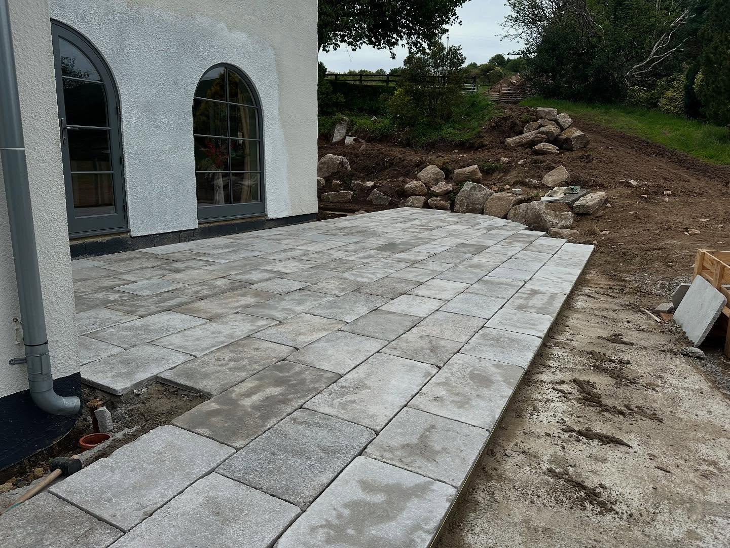 A busy week installing these stunning limestone slabs from @quornstoneofficial in between the Dartmoor weather, a big week next week to finish all the slabbing ready for grouting #chagford #dartmoor #landscape #landscaping #gardendesign