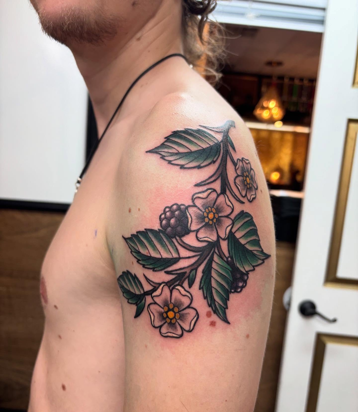 Something a little different from today! Had lots of fun with this custom trad-based blackberry branch for a cool guys first tattoo. #tattoo #traditionaltattoo #neotraditional #blackberry #blackberrytattoo #colortattoo #queertattooartist
