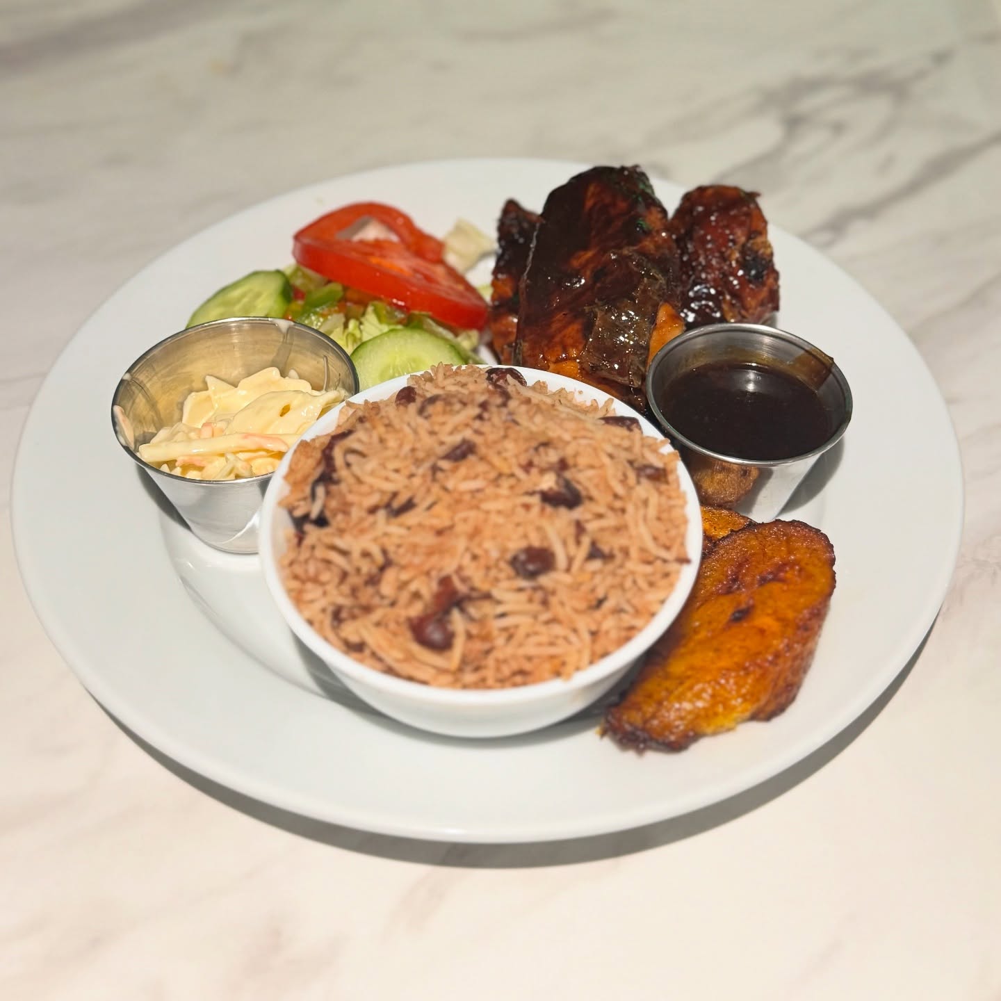 Smoked, Spiced and Serious Flavours๐ฅ๐ Our Famous Jerk Chicken Goodness on a plate with all the trimmings๐๐ #jerkchicken #islandvibes #foodie
.
.
.
Follow us on TikTok!! paradise_romford
.
.
.
#Caribbeancuisine #jamaicanfood #chef #caterer #restaurant #romford #paradise #family #business #lounge #bar #jamaican #love #food #lounge #bar #essex #london #cocktails #events #catering #services #sweets #dinner #explore #explorepage #viral #festivals