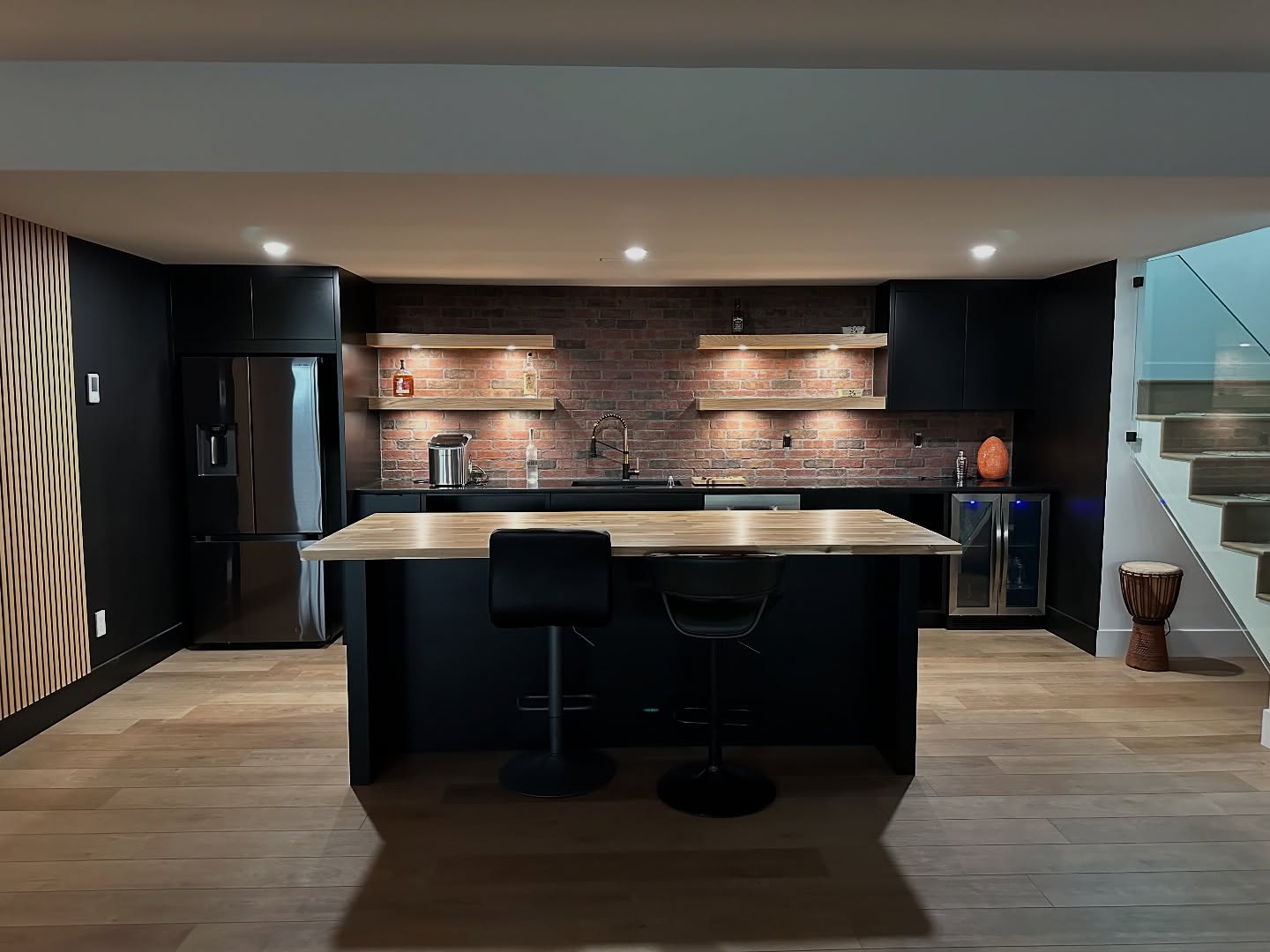 Sometimes when you finish a great project, you don’t want to leave when you’re done… Built this great bar space - our stone/tile guy @crrenotb had his work cut out for him with the brick install, but ultimately worked his magic and came together with the custom built cabinetry I did. The accent wall helped tie in the custom floating shelves and countertop with the lighter flooring, and all together the light balanced perfectly without being too dark.
#yxecarpentry #yxehomes #finishingcarpentry #yxeliving #yxeconstruction #supportlocalyxe #lawrencefinishing #mancave #builtinbar #basementbar #custombar