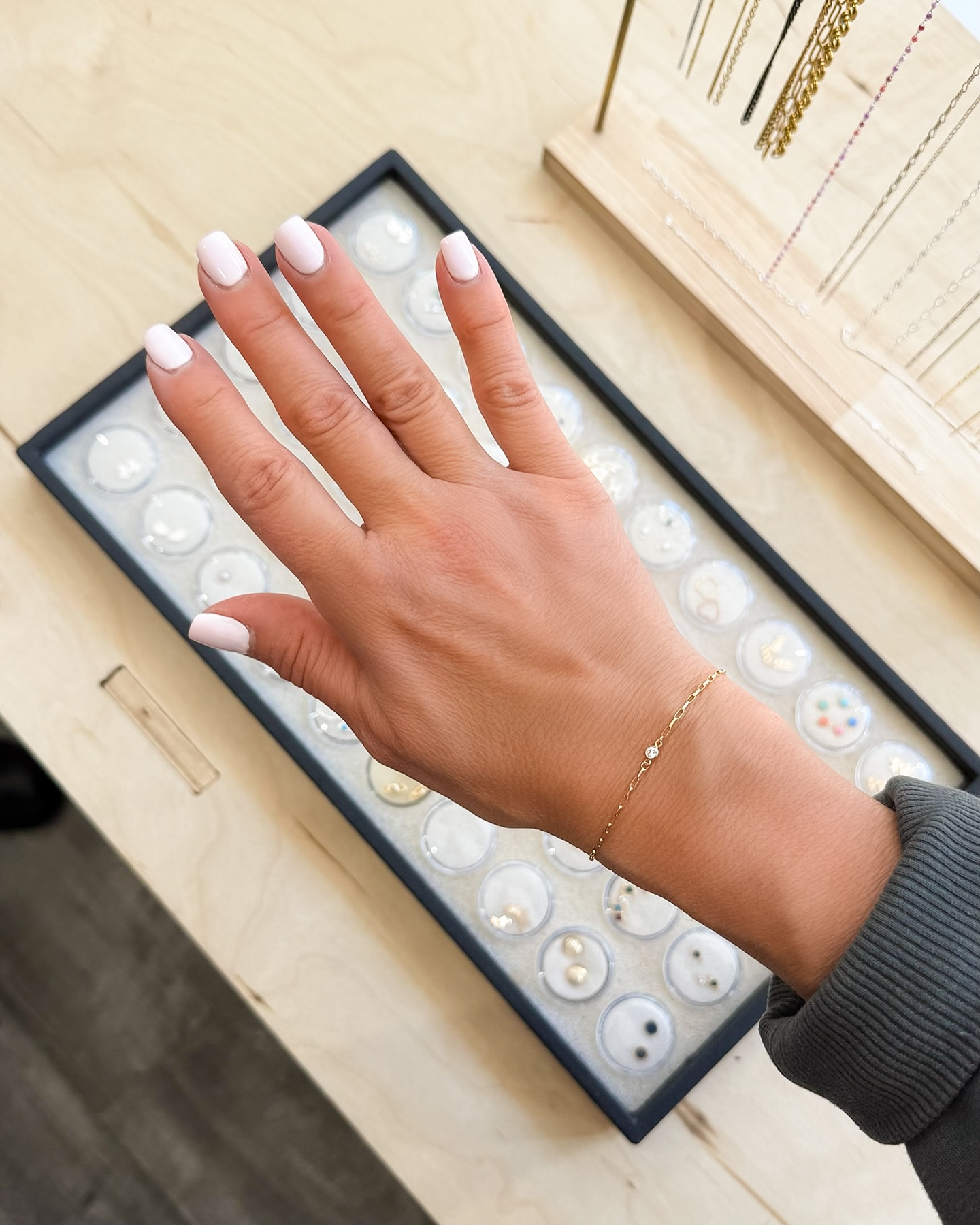 Pick your permanent chain, keep it sleek & simple—or add a special charm! ✨ Any way you wear it, our welded jewelry is elegant, understated—and totally YOU! #permanentjewelry #newbedford #shopdnb