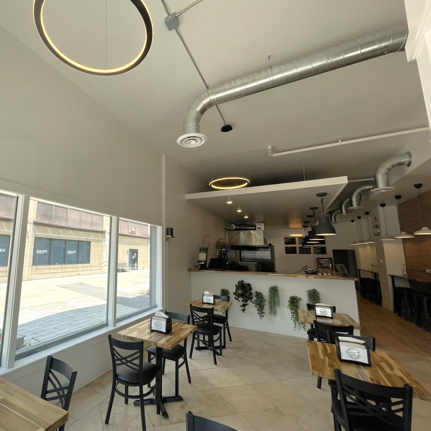 Downtown Elmira's newest restaurant is now open! The newest of a growing list of new businesses choosing to locate in Elmira’s Central Business District, @tossed_and_more has built up a loyal customer following over many years on Market Street in Corning's Gaffer District. It will now offer its customizable and delicious salads, wraps, buddha bowls, gyros and more, at a newly custom-designed location at our property at 120 North Main Street! Tossed provides unique, high quality, locally sourced food offerings at reasonable prices, centrally located just across the street from the LECOM Event Center, open Monday through Saturday, 7:30 to 3:00!
#capriottiproperties #downtownelmira #elmiradowntown #elmirany #historicarchitecture #historicrenovation #historicrestoration #lunch #restaurant #eatlocal #freshandfast #shoplocal #mainstreet