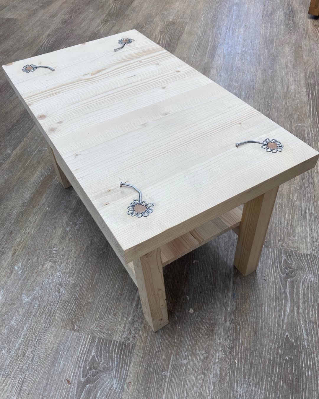 Impressive detailing, imaginative use of nails to create flowers.