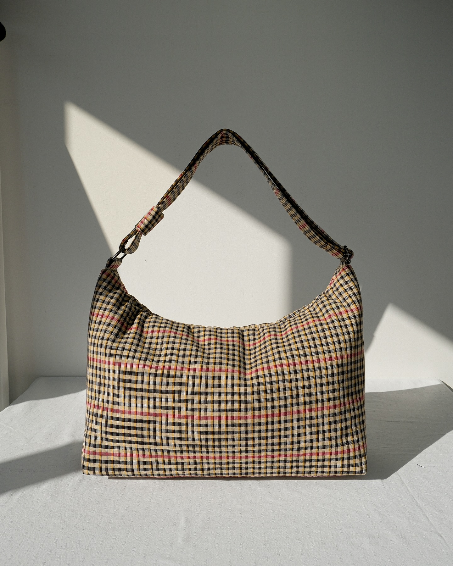 The pillow bag size 02 in Vintage Checkered 🌸
--
Handmade & designed in Belgium.
—
www.elevengooddays.com