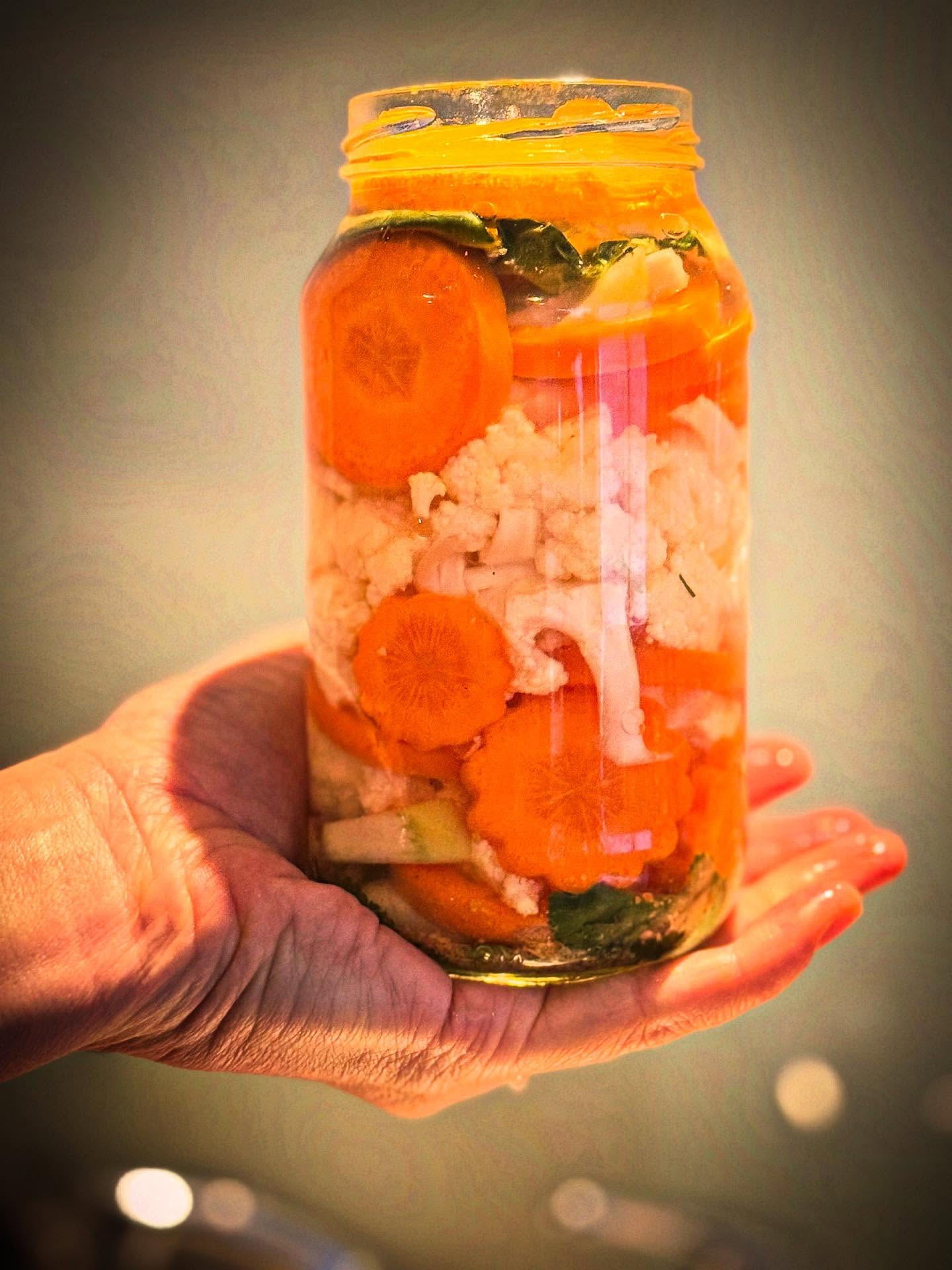 Whoopee assisting long time friend Marcea Klein, in her fermenting class . A food educator only just in her 80’s , a kindly energy ball of good food wisdom & reality truths of today’s industrial food system filters through into a gentle class. Wholistic knowledge like hers is acquired through experience & ongoing research. She’s still authoring educating, cheffing wholefoods and an integrative mind-body health coach. Since her pioneering work in the 1960’s with organic wholefoods in the USA, Marcea has chalked up an impressive record of ventures. She opened Berkeley California’s first wholefood eatery, a bakery in London, ( Cranks ) Australia’s first traditional tofu factory in Sydney, where she also estb the East West Centre, Wholesome Gourmet Cookery School. (where I met her, studied, assisted her , with her ground breaking cook books, cooking classes Syd’s 1st macro shop & her yoga retreat catering. inspired to fire up my food pathway, realisations on the true value, the real price we pay for industrial food, protect our good food systems, social entrepreneurship. not just me Marcea projects have sparked many a health practitioner, parent & food business with seeds of food knowledge. She has also written widely on food and nutrition, penning a whopping 8 books, been a regular contributor to the SMH Wellbeing magazine and Nature & Health magazine. As a presenter, in the 80’s -90’s Marcea appeared on SBS & ABC TV. “ nowadays focusing her teaching in intimate cooking classes in Elizabeth Bay & community college in Rozelle ( Syd) . Oh as for fermenting, I learnt from her the value of fermentation 40 yrs ago and it’s only recently that science is catching up recognising biomes and gut bacteria. Interested in joining go to marcea Klien’s page . She’s in Tozelle again say 5th July come join us. I’m assisting, yep Still learning with good peeps .