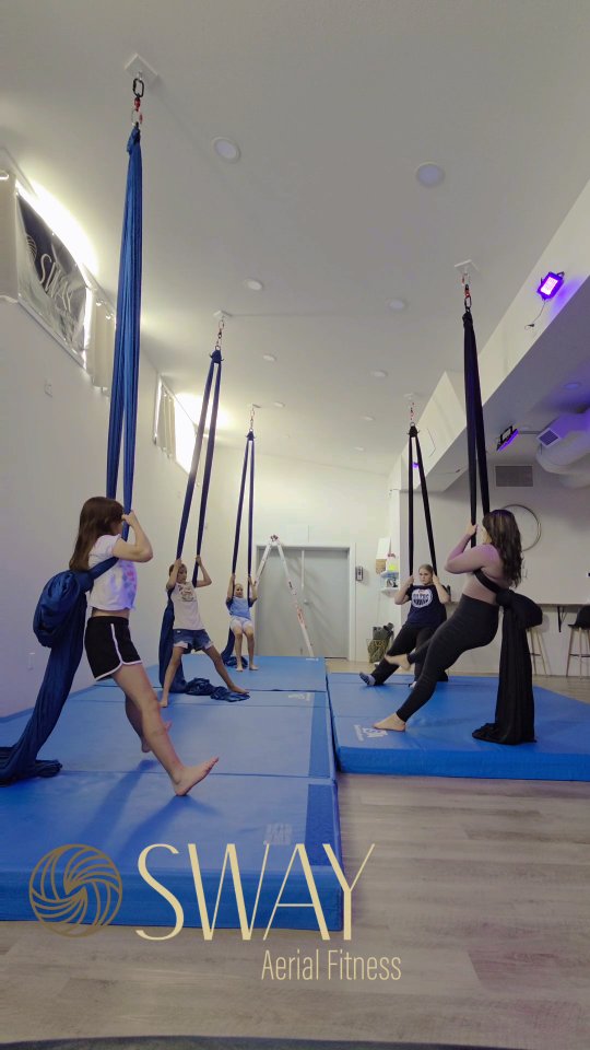 There’s something truly magical happening in our Kids Circus Class at Sway Aerial Fitness—and it’s more than just flips and silks.
With Aerial Coach @_janaelindsey leading the way, our girls are learning to dig deep, find their strength, and fly with confidence. ✨️
They’re working hard on:
🔹 Straddle inverts & elevated pikes
🔹 Knee tucks & sit-ups
🔹 Crochet leg dead bugs (yes, it’s as fun as it sounds!)
…and growing more graceful each week with skills like the Iron T, Hip Key variations, and the beautiful Fleminco Arabesque—on the ground and in the air. 🌬️🩰
But more than anything, this class is about heart. It’s about creating a space where youth feel safe, encouraged, and celebrated—where they can push themselves, mess up, try again, and believe in their own strength. 🫰🏼
Watching them grow... physically, emotionally, and creatively, is the greatest joy. 💛
Find us now on 📲 @mindbody
#YouthEmpowerment #AerialKids #FlyingWithHeart #StrengthAndSoul #ConfidenceInTheAir #CircusMagic #AerialFamily #SwayAF