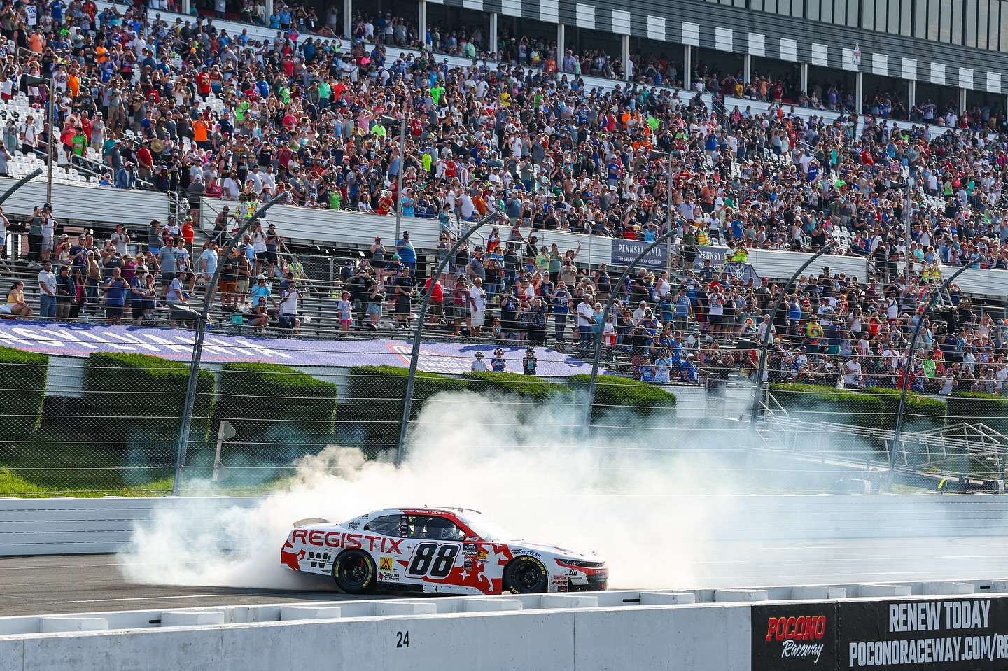 Heck yeah!!!! What a day at Pocono. Finally got myself an oval win in the Xfinity series. Pretty cool having @dalejr step up as my interim crew chief for the day and getting to share the moment with him as well. Thank you to everyone at @jrmotorsports for all of the hard work as well as @registix for coming on board!