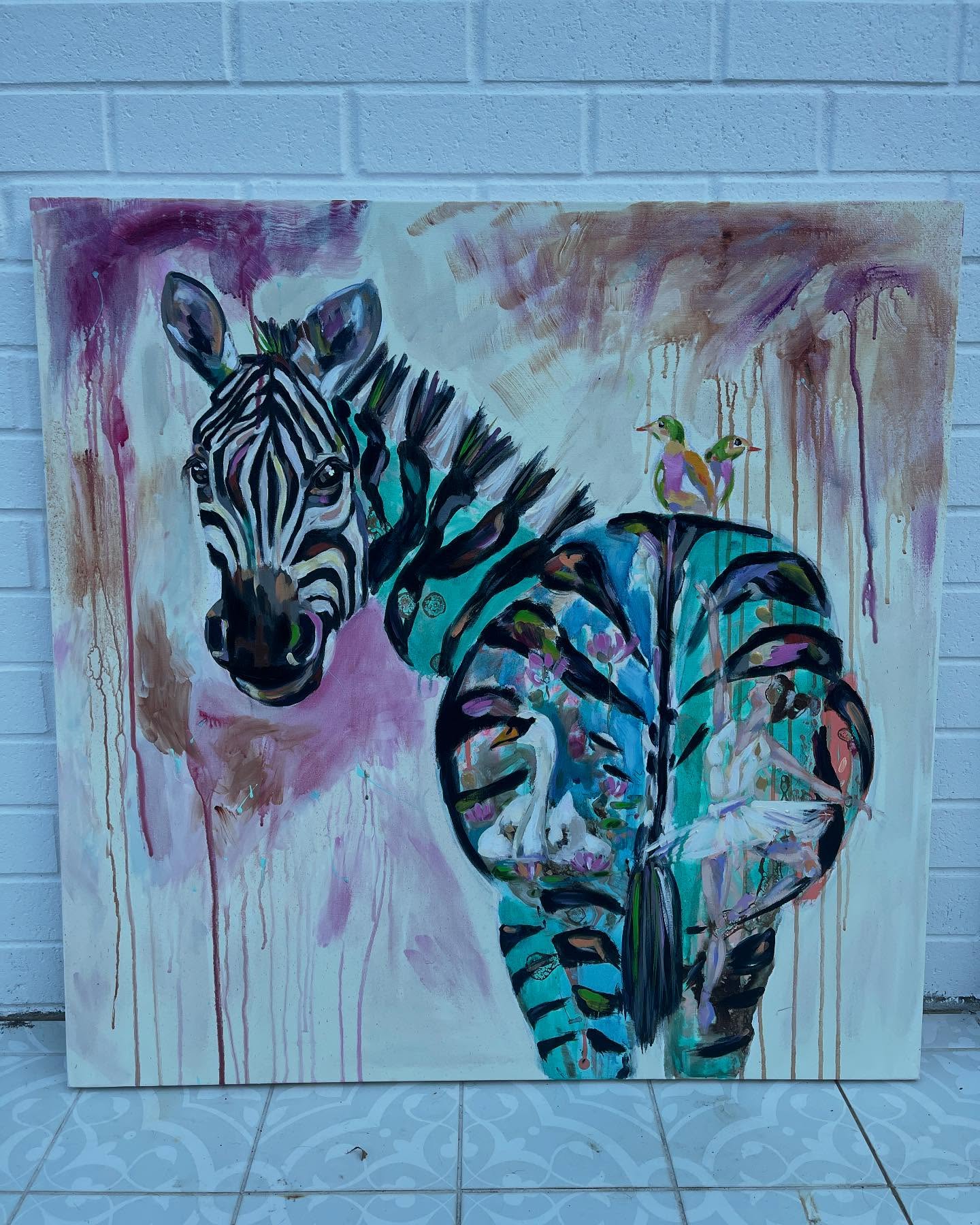‘Whispers of Grace’ is finally finished. I had completed the first acrylic and inks layer some time ago, but she’s been waiting patiently for her final oil layer which makes her so much more juicy and brings her to life. This painting Is about energy and connection. Specifically this time the energy of Grace which threads through the zebra, dancer and swan as one force. Separation is an illusion. There’s more that connects us than keeps us apart, both human and animal. We’re all part of one great energetic sea, like water drops melting to the whole. And I’ve become interested in exploring this in my art. What do you think? She’s 90x 90 c/m and available for sale. 💕