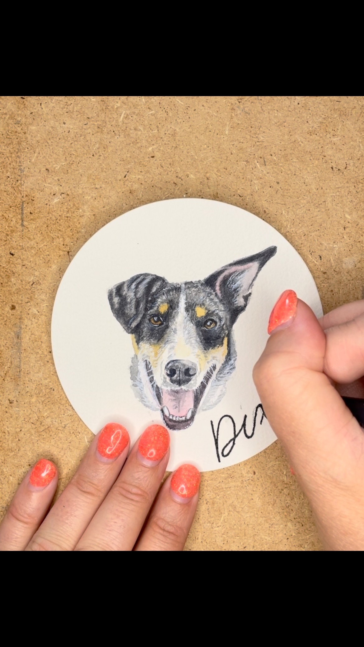 Loveeee painting these adorable pet portrait ornaments! Writing the name on them — instant anxiety😅