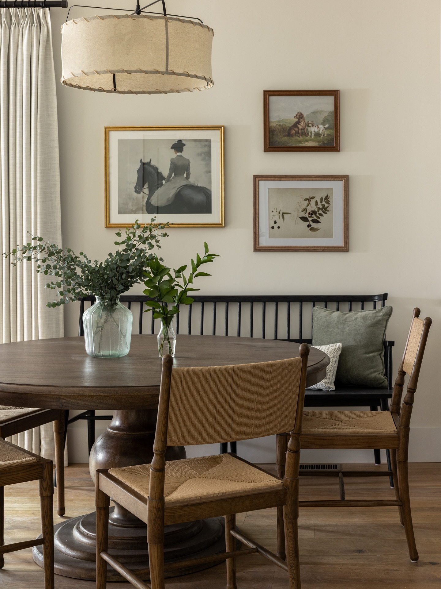This dining nook right off the kitchen was created to maximize dining capacity and give ample walking space from the kitchen to the living room. We tucked this beautiful bench at the end of the cabinetry, scooted the light fixture over and curated all the decorative details to achieve a collected space that is equal parts beautiful and functional.
Photos: @ggray_photo
#diningroom #casualdesign #interiordesignri #diningnook #eatinkitchen
#diningtable #gallerywall #threesparrowsdesign