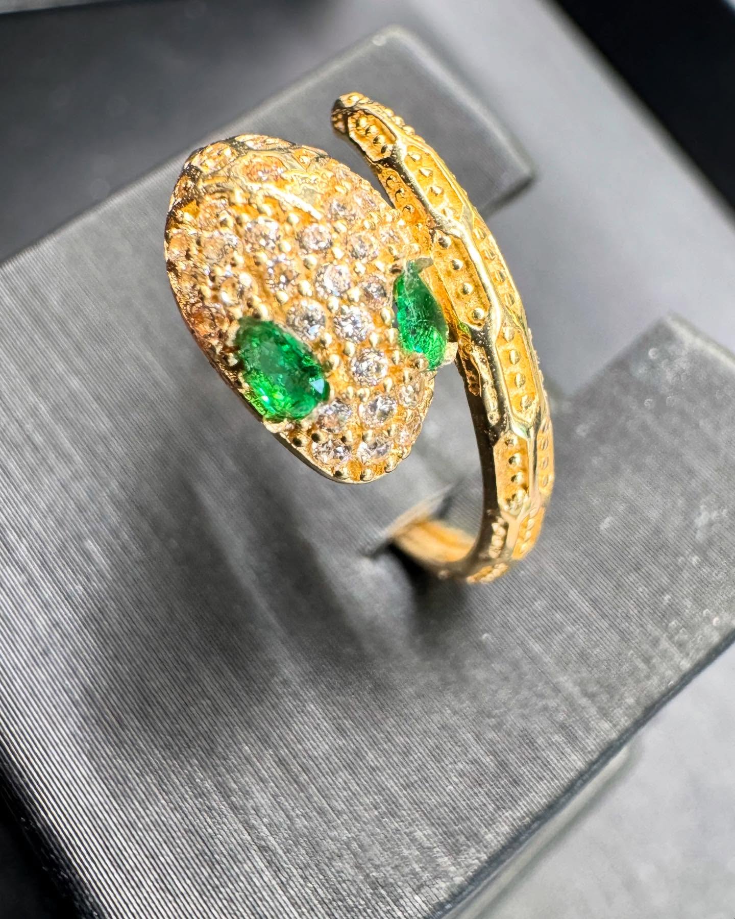 Here’s a super fun piece brand new, in from one of our manufacturers! 14k Yellow gold Snake Ring with custom green emeralds for eyes! A super fun piece ready to be worn. Stop on by today to take a closer look!