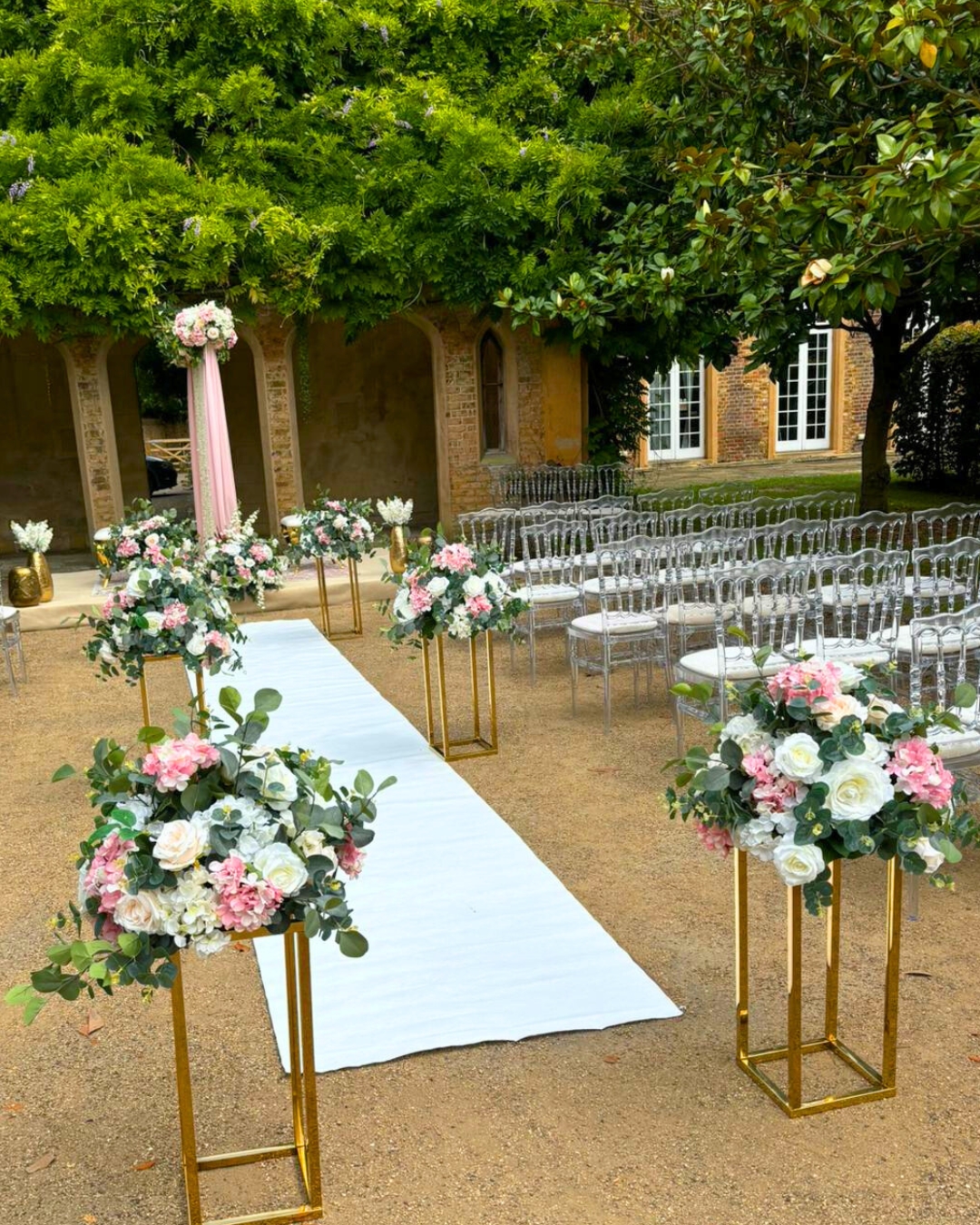 Aisle ready and waiting.
🌿
This floral-lined garden setup is one of the many ways we create unforgettable #WeddingCeremony moments at #DittonManor.
🌸
Surrounded by nature, elegant architecture and perfectly placed blooms, this is what a romantic #OutdoorWedding should look like.
💐
From pastel petals to polished #WeddingDecor, every detail is part of the story.
✨
#Weddings #GardenWedding #CeremonyStyle #WeddingInspo #LuxuryWedding #EventStyling #FloralDesign #BerkshireWeddings #WeddingSetup #UKWeddingVenues #RomanticWeddings