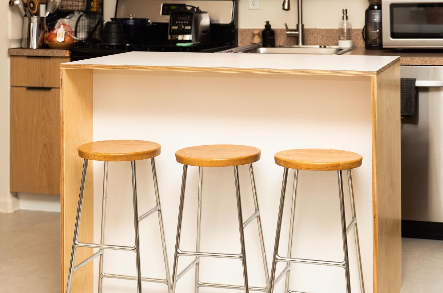 When you’ve got a juicer, some cookie sheets and a food processor that just don’t fit in traditional cabinets.. you build the cabinet around the appliances!
We had a great time designing and building this minimalist kitchen island. Drawing inspiration from traditional Scandinavian design, we utilized white matte laminate and Baltic Birch plywood with polished edges to achieve a clean, simple look.
Functional furniture makes all the difference ✨
#pathdesign #pathdesignco #followyourpath #woodworking #customfurniture #handmade #bespoke #customwoodworking