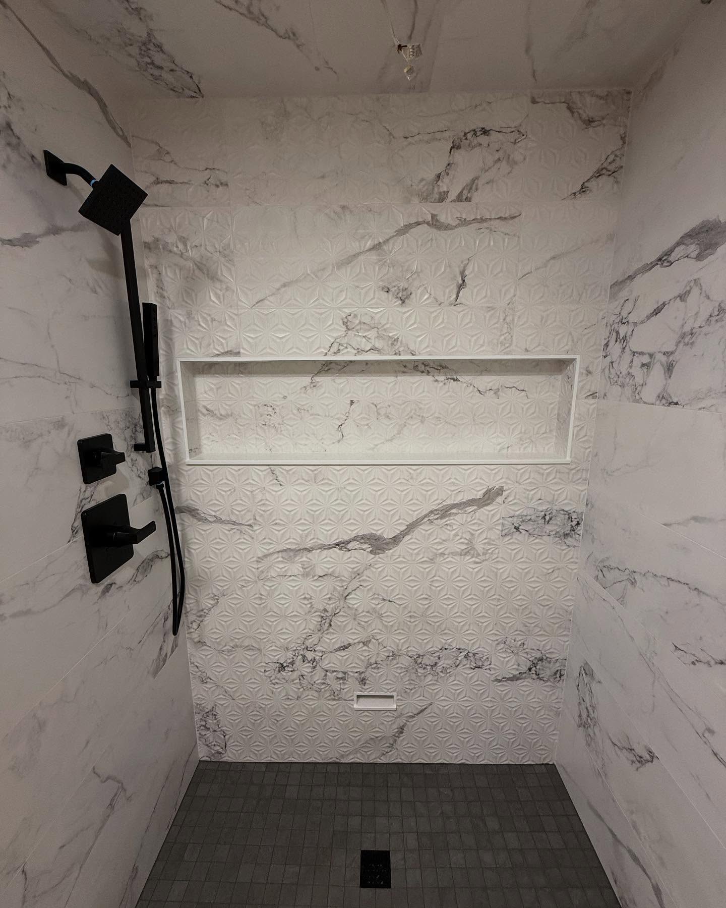 One of the bathrooms we’ve been working on this month. Just waiting for the shower door. They opted for a cool 3D pattern tile for the back wall. Love how this turned out.
#tile #bathroomremodel #bathroom #remodel #subwaytile #kimbletile #geneseeceramictile #schluter #durock