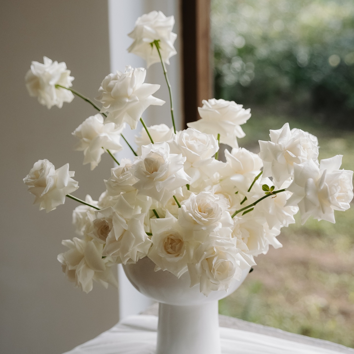 This ceremony setup is giving minimalist elegance with a touch of playful romance. Clean lines, sculptural white blooms, soft draped tulle, and natural textures set the stage for one unforgettable "I do" moment.
From the sweet kiss to the effortlessly chic floral arrangements, every detail is curated to feel both elevated and fun.🤍
📸 @conwayphotoandfilmsa
Love this look? Let’s bring it to life for your day.
💌 DM to start planning your dream ceremony!
#weddinginspo #modernwedding #minimalistwedding #ceremonydecor #whitewedding #elegantwedding #weddingflowers #floraldesign #decorwithintention #funandfresh
