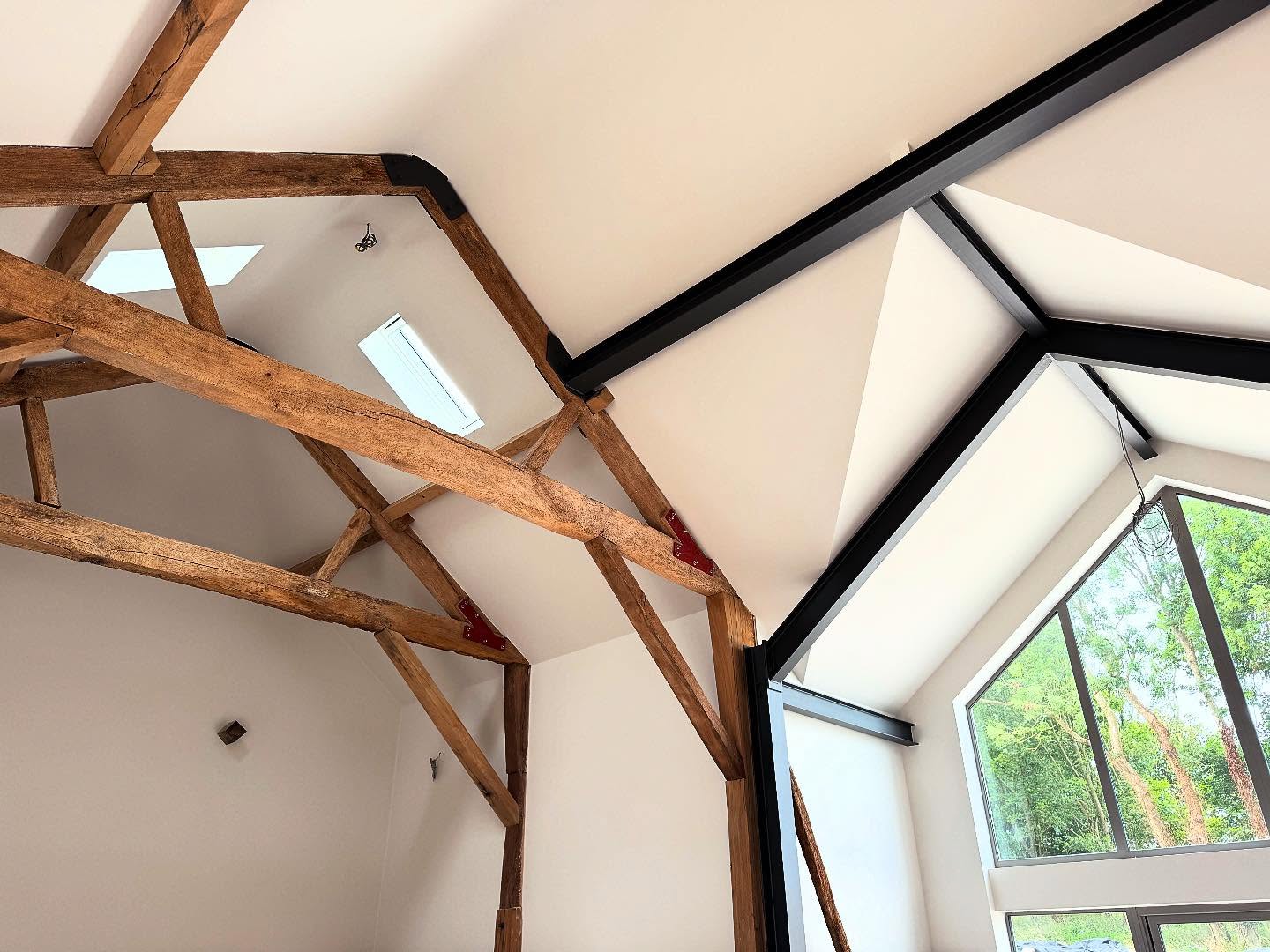 When the old meets the new…. Progress at our barn conversion project is coming along very nicely. The comparison between the exposed original Oak trusses and the new steal structure is a thing of beauty.
We’re hopping to have this project all wrapped up by the end of the summer and can’t wait to show you how it turns out…
#barnproject #barnconversion #oakbarn #barn #construction #bespokebuild #bespokeconstruction #bespokebuilders #architecture #architectural #stealandoak #architecturaldesign #interiors #interiordesign #structuraldesign #conceptbuilds #asuniqueasyou