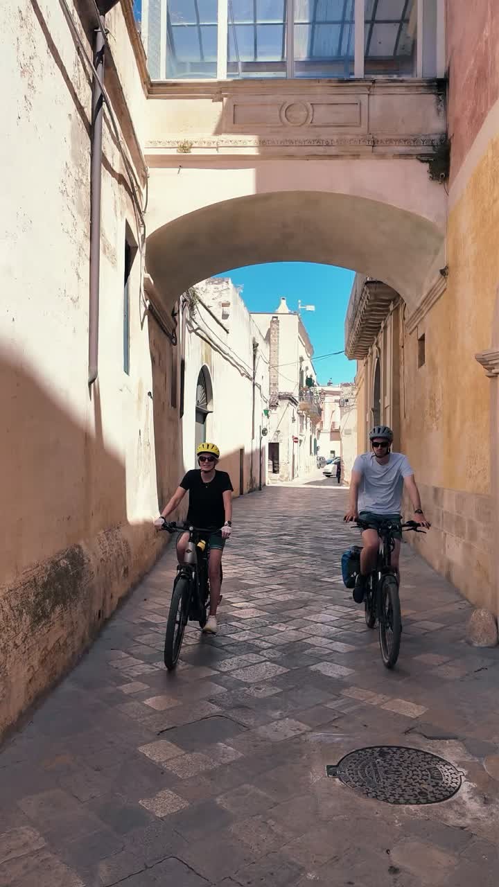 To ride through Salento’s historic towns is to follow the quiet rhythm of a place that still breathes with grace.
Stone alleys wind between faded façades and sunlit piazzas.
Arches rise above the cyclists, like silent witnesses of centuries past.
Doors weathered by time.
Shadows that dance gently across ancient stone.
And always — that perfect southern sky, impossibly blue.
Here, the baroque is not only a style.
It’s a feeling etched into every corner.
A soft magnificence that doesn’t need to announce itself.
Pedaling through these streets feels less like sightseeing, and more like belonging —
to a slower pace, to a deeper beauty, to something quietly extraordinary.
This is a journey for those who appreciate the art of seeing and the luxury of going slow.
#pugliabikeexperience #leccebiketour #pugliabikerental #cyclinginpuglia #publiabiketours #hikingpuglia #luxurytravelitaly #leccebikerental #slowtravelpuglia #pugliahikingtour #pugliabiketour #pugliaadventures