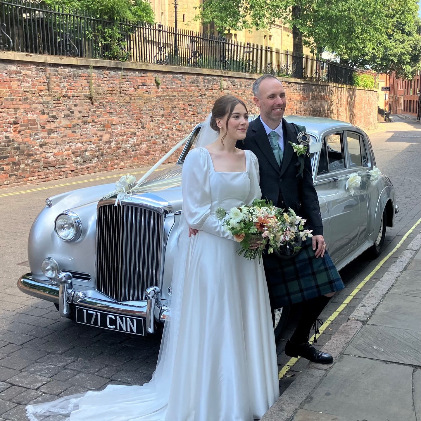 Congratulations to Stephen & Anna, seen here on their (very hot) wedding day this week with our silver Bentley S1 outside the Lace Market Hotel.
#lentonlimousines
#lacemarket
#nottinghamwedings