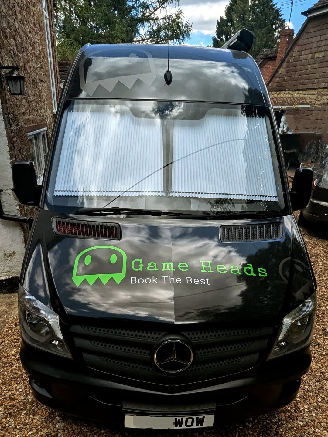 Looking for an epic gaming experience ? The WOW van is geared up and ready to roll! It's not just any van โ it's the only one packing 12 Xbox Series X consoles inside with 12 ultra high Def 4k screens, ready for some serious multiplayer action.
And get this: Game Heads are the only gaming van company to bring you a 12-seater van where all the players get to chill out in a row with plenty of legroom. No cramped quests here! Plus, we've got you covered with air-con or heating with custom cab blinds to keep you comfortable whatever the weather throws on the day!
The best part? You don't need to lift a finger! Our awesome staff member is on hand to make sure your gaming session is super smooth. Get ready to level up when you "Book The Best"