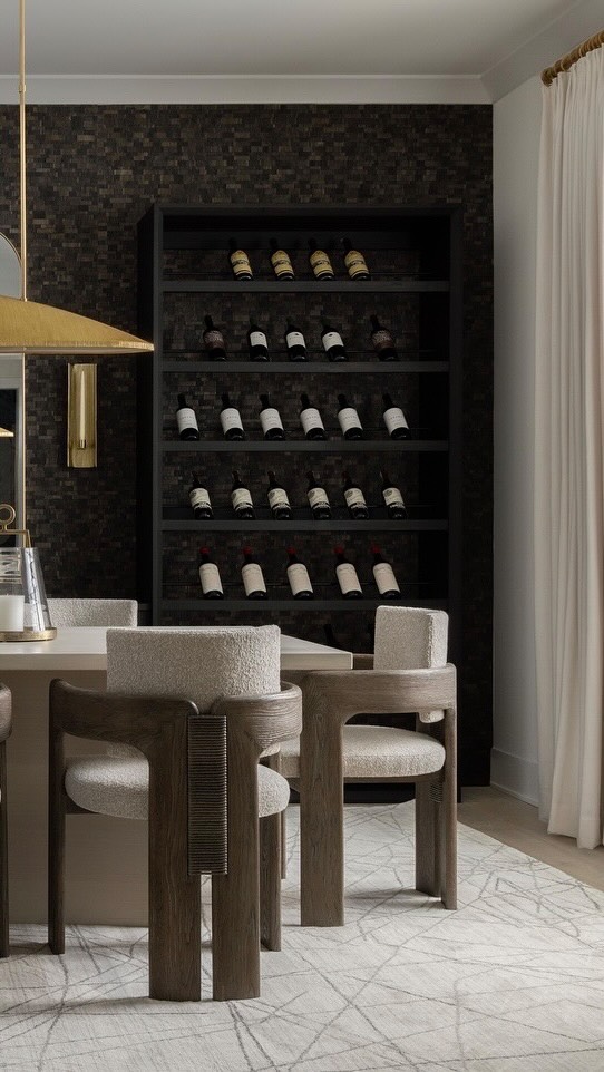 Before & After: Character, Poured Generously
This dining room started as a blank canvas in a brand-new build—no soul, no story. We layered in depth with bold, textured wallpaper, added a custom wine wall and pouring station, and built a dining table made to gather generations. Brass accents catch the light just enough, while the bespoke built-ins bring both style and storage. Now, it’s not just a dining room—it’s a space that speaks.
#diningroomdesign
@ryanshapirophotography
—
modern interior design, collected living, high-end renovation, quiet luxury, layered design, moody color story, curated details, soulful spaces, functional layout, warm modern interiors, architectural millwork, beautiful storage solutions, inviting interiors, designed to evolve, intentional styling, built-in cabinetry, sculptural lighting