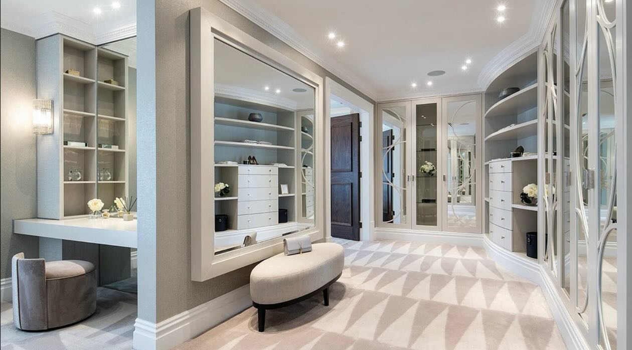 This master dressing room utilised bespoke joinery, mood lighting and lots and lots of mirrors.