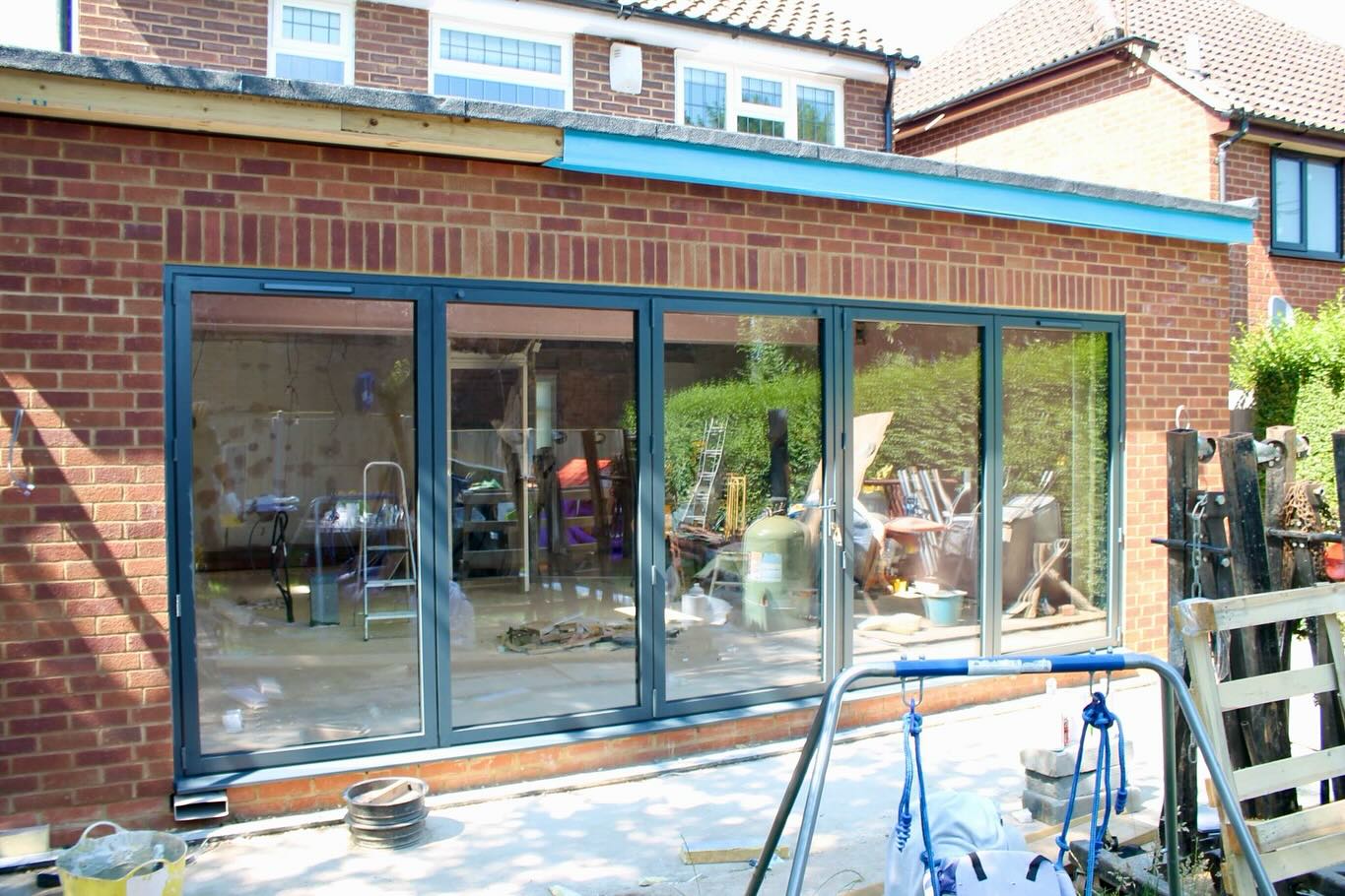 Recent installation of a 5 pane bifold ready for the sunshine ahead☀️
SMARTS Visofold 1000 bifold door, working as a 3+2 system with the master door in the centre. Anthracite Grey frames and colour coded handles and hinges.
Installed into a pre-prepared opening so our customer could stay in their home during renovations. No stress about an open back wall! 🏡🔧
For any enquiries please send us over an email to:
📧showroom@gxhomeimprovements.co.uk
Or call us or arrange a free site visit:
📲0175389128
#HomeRenovation
#GXHomeImprovements
#BifoldDoors
#AluminiumDoors
#NewDoors
#GerrardsCross
#HomeImprovements