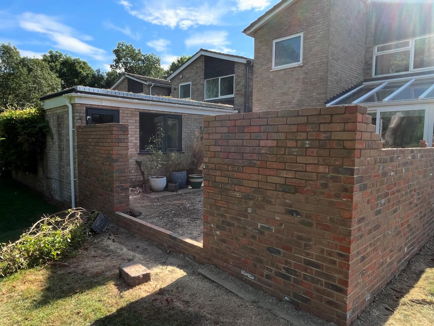 New little job started this week new wall to be build and new patio to be installed next week. Old decking removed and old wall knocked down after many years of frost damage being replaced with a frost resistant brick to give the wall a longer life span. #alderson #building #wall #garden #landscape #brick #bricklayer #brickie #patio #demolition