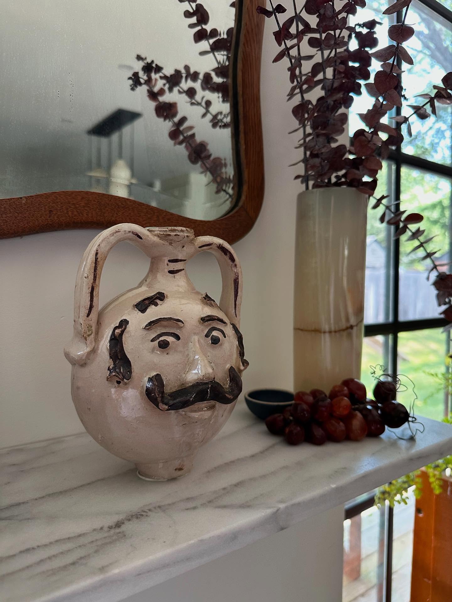 Get the weird stuff!
Get the stuff that makes you smile. Get the stuff that makes you hunt down museum wax so you can secure it to your shelf without falling because you love it so much.
This little Italian vase was purchased at an online auction and it just brings joy. I mean.. look at that face?
What’s the decor item that brings you joy?
Buy the weird stuff.
#buyvintage #vintagedécor #shanalutherinteriors #hudsonvalleyinteriordesign