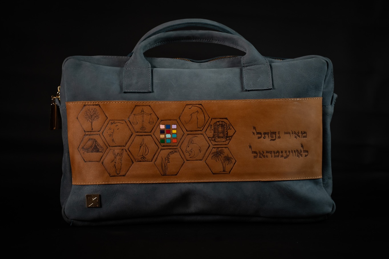 New design!!!
We’ve been working very hard to create our new travel collection.
It has travel bags for tallit and tefillin bags.
This one is a specially made blue travel tallit bag with an extra internal pocket and the 12 tribes drawing on the outside.
DM for more or go on our website