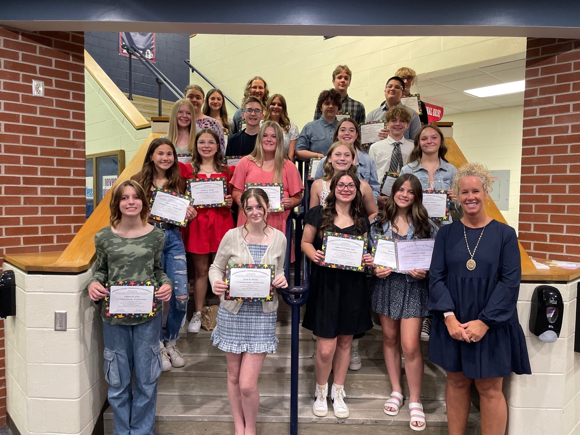 The ACCF and the Don Wood Foundation have partnered up to update the 8th Grade Literacy Scholarship application. Previously, the ACCF Literacy Scholarship awarded books and magazines to students placing in first, second, and third places. This scholarship has been updated to allow students STEM products. Based on the quality of their application, local 8th grade students were offered to opportunity to win a first place, second place, third place, and a premier literacy STEM award. The premier Lit-Stem award is a programmable robot with an estimated value of $100! Pictured are 1st place winners from Bellmont, South Adams, St. Joe and Zion.