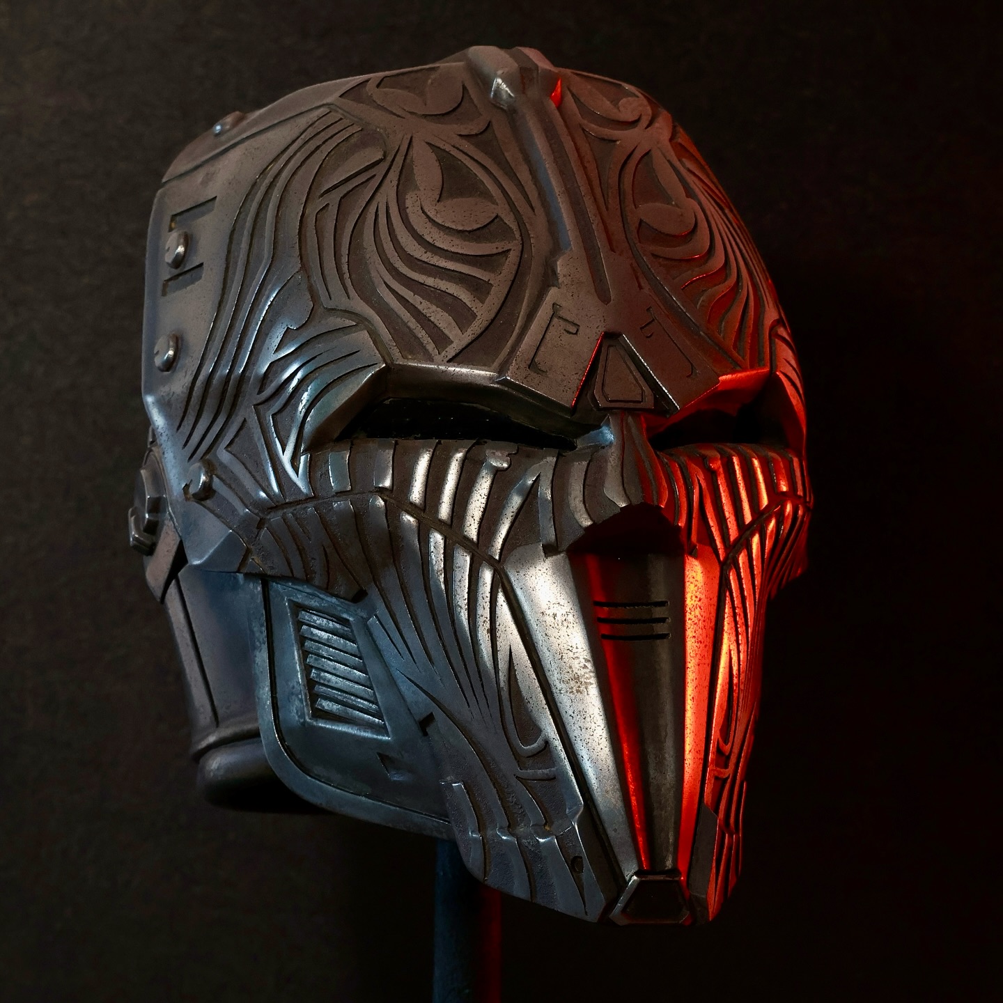 Sith Acolyte Helmet — relic of the Old Republic era. Forged in the image of those who served the dark side in secrecy and strength, this helmet draws inspiration from the shadows of Dromund Kaas. I’ve been crafting these for over a decade, but this one holds a special place — a tribute to the Sith legacy, now displayed proudly in my workshop.
#SWTOR #MynocksDen #StarWars #SWTORfamily #SithAcolyte