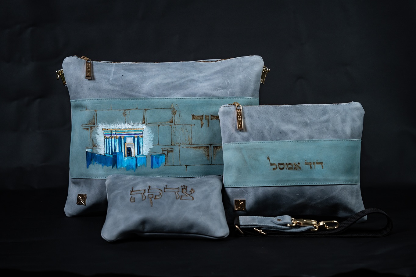 PAINT!!! This is a very special set of bags.
It’s one of the first times that I’m adding colors to our bags.
A clients asked me to add the 3rd temple to that bag in colors so I got exited and bought leather paints.
What do you think? Let me know in the comments