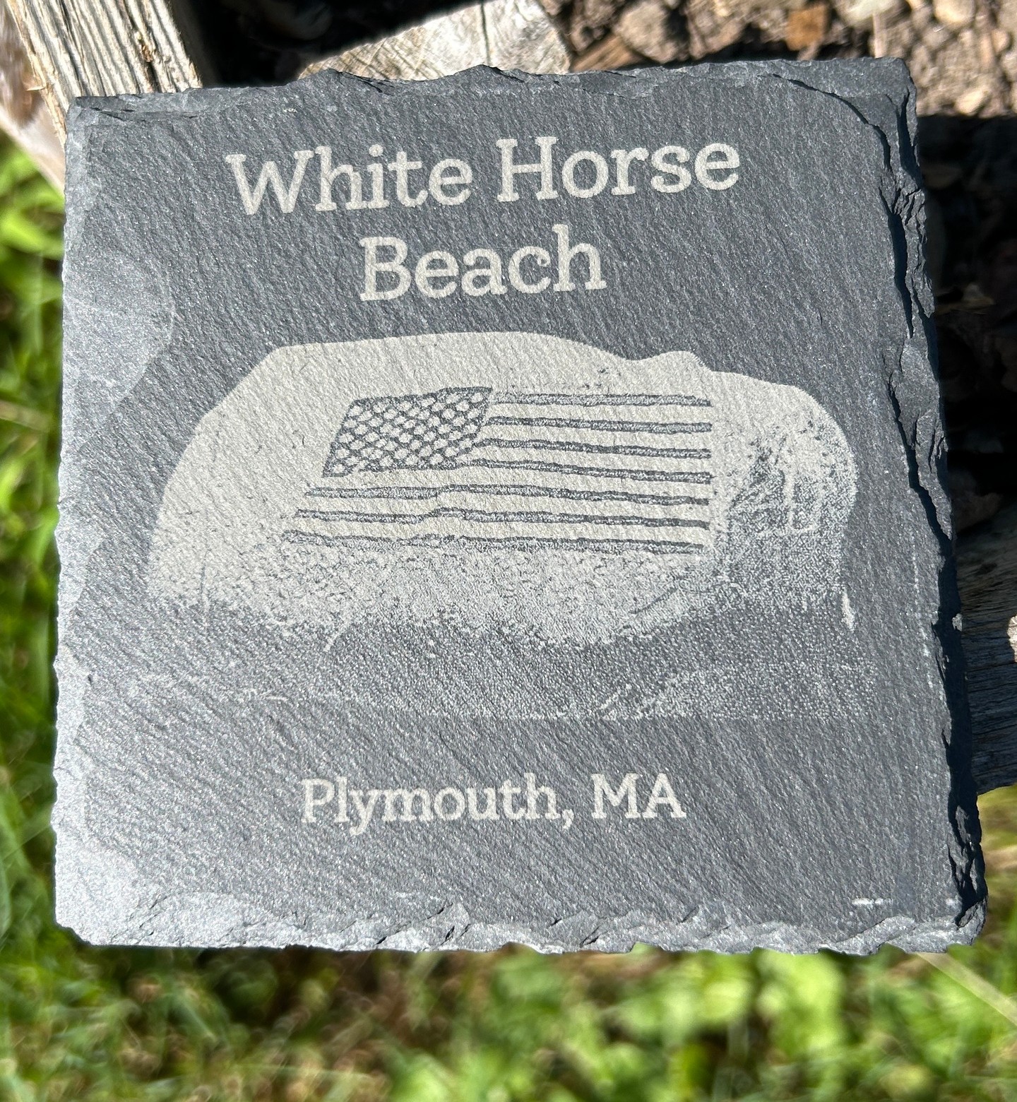 Transform your home with elegance! Our WHB Flag Rock Slate Coasters are perfect for adding a touch of nature to your coffee table. Each coaster is laser engraved with a breathtaking view of Flag Rock. #HomeStyle #Coasters #InteriorDesign #whitehorsebeach #flagrock #plymouthma #laserengrave