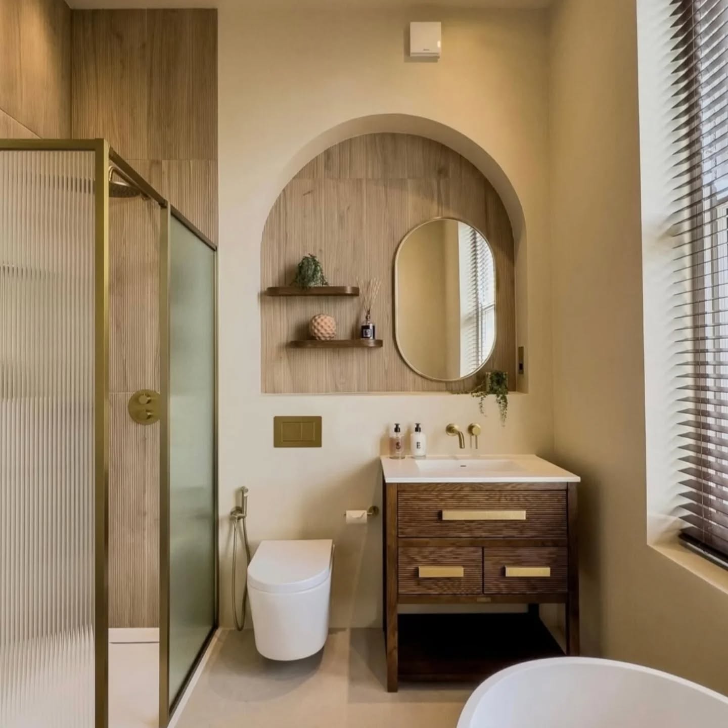 ✨ Transform your bathroom into a serene oasis with elegant neutral earthy tones and stunning gold metal accents! 🌿 At Tivoli Interior Designs, we specialize in creating relaxing spaces that help you unwind in style. 💫 Contact us today for a free, no-obligation quote and let us bring your dream bathroom to life!