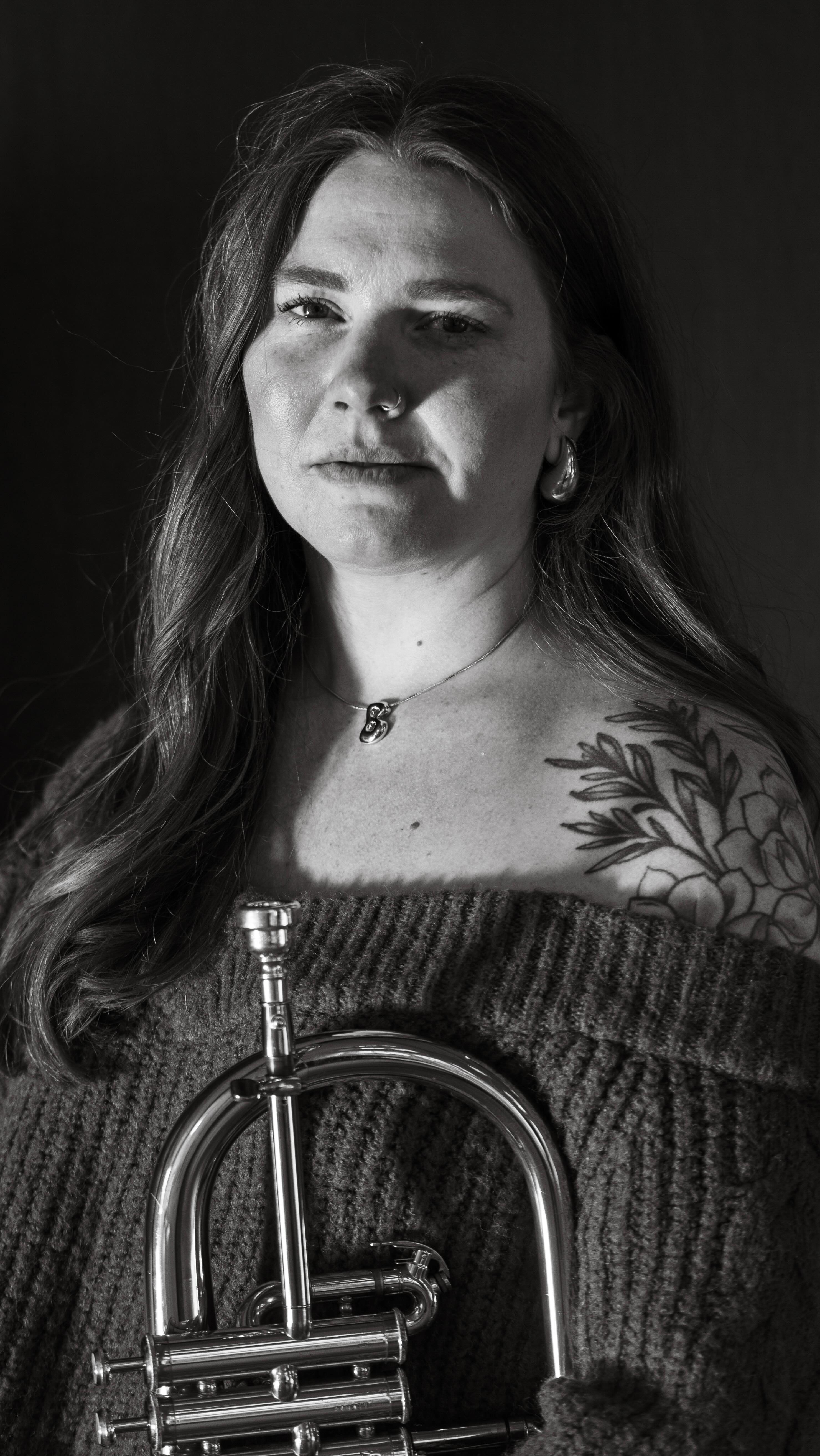 After receiving such overwhelming positive feedback from my performance at the International Women’s Brass Conference and my recent album, body, mind, & heart, I wanted to share this video with you all.
I first heard @jaredwallistrumpet play this piece a couple years back at the International Trumpet Guild Conference and immediately approached him to play it. I created and added the video element when I performed it at a faculty recital at Crane and am grateful for Jared’s willingness for me to record it and continue to share in this capacity.
TW: This piece touches on child abuse and death. Please listen with care.
We Are Still Here by Jared Wallis
Brianne Borden, trumpet
@poliveri, sound, mixing, & mastering
body, mind, & heart can be found at www.brianneborden.com