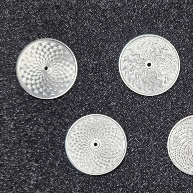 Before the color. Before the fire. It all begins here.
Each of these dials has just completed the second stage of our process—hand-engraving on a century-old 1914 Rose Engine Lathe, guided by the hands of a master craftsman with over 40 years of experience.
Look closely and you might spot some new patterns emerging. Yes, something fresh is in the works… 👀
At 5280 Watch Company, we use the old-world Basse-taille technique to breathe depth and brilliance into every dial. These intricate patterns—cut in pure silver—will soon be layered with rich enamel, catching light from every angle.
This is what bespoke truly means:
🎨 Choose your color
🔷 Choose your pattern
🧭 Choose your case & finish
🖤 Choose your strap
Every piece, made one at a time. Made to tell your story.
🛠️ Bespoke. Enamel. Engine-turned.
⛰️ Made Mile High.
#5280watchcompany #bassetaille #roseengine #guilloché #Watchmaking #enameldial #mademilehigh #coloradocrafted #ᴡᴀᴛᴄʜᴄᴏʟʟᴇᴄᴛᴏʀ #handcraftedtimepieces #somethingnew